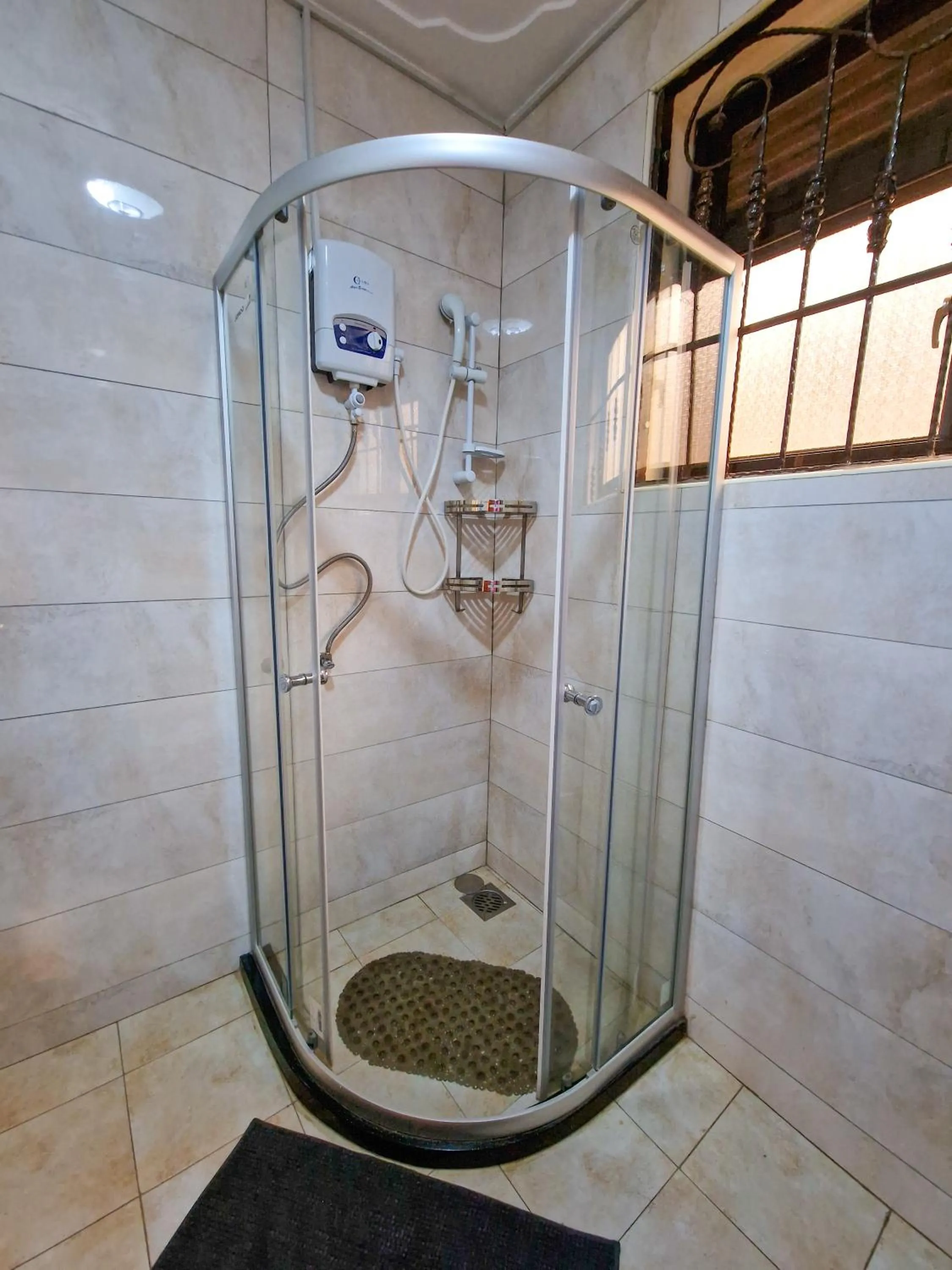 Shower in Eric Wilkins Apartments