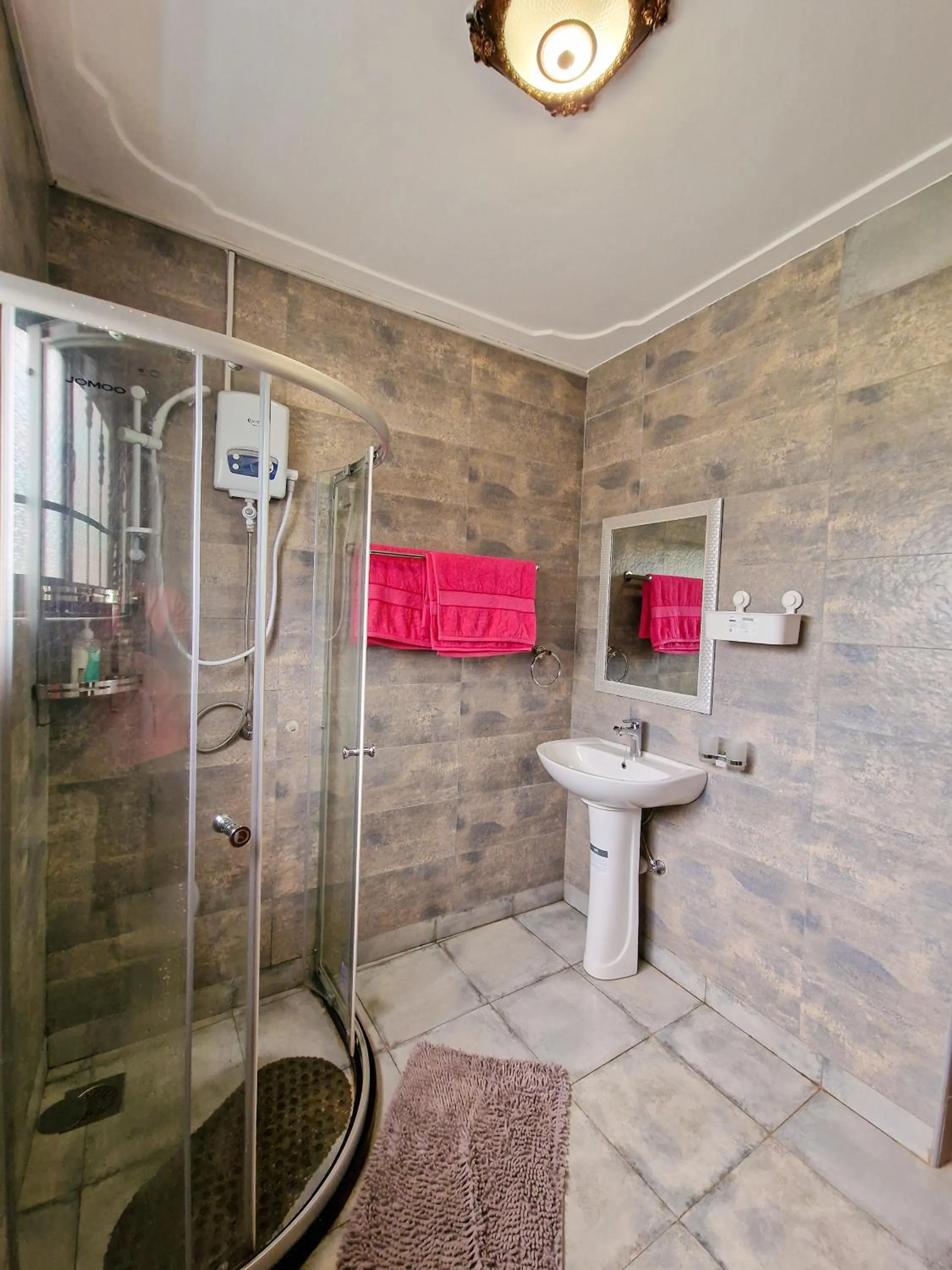 Shower in Eric Wilkins Apartments