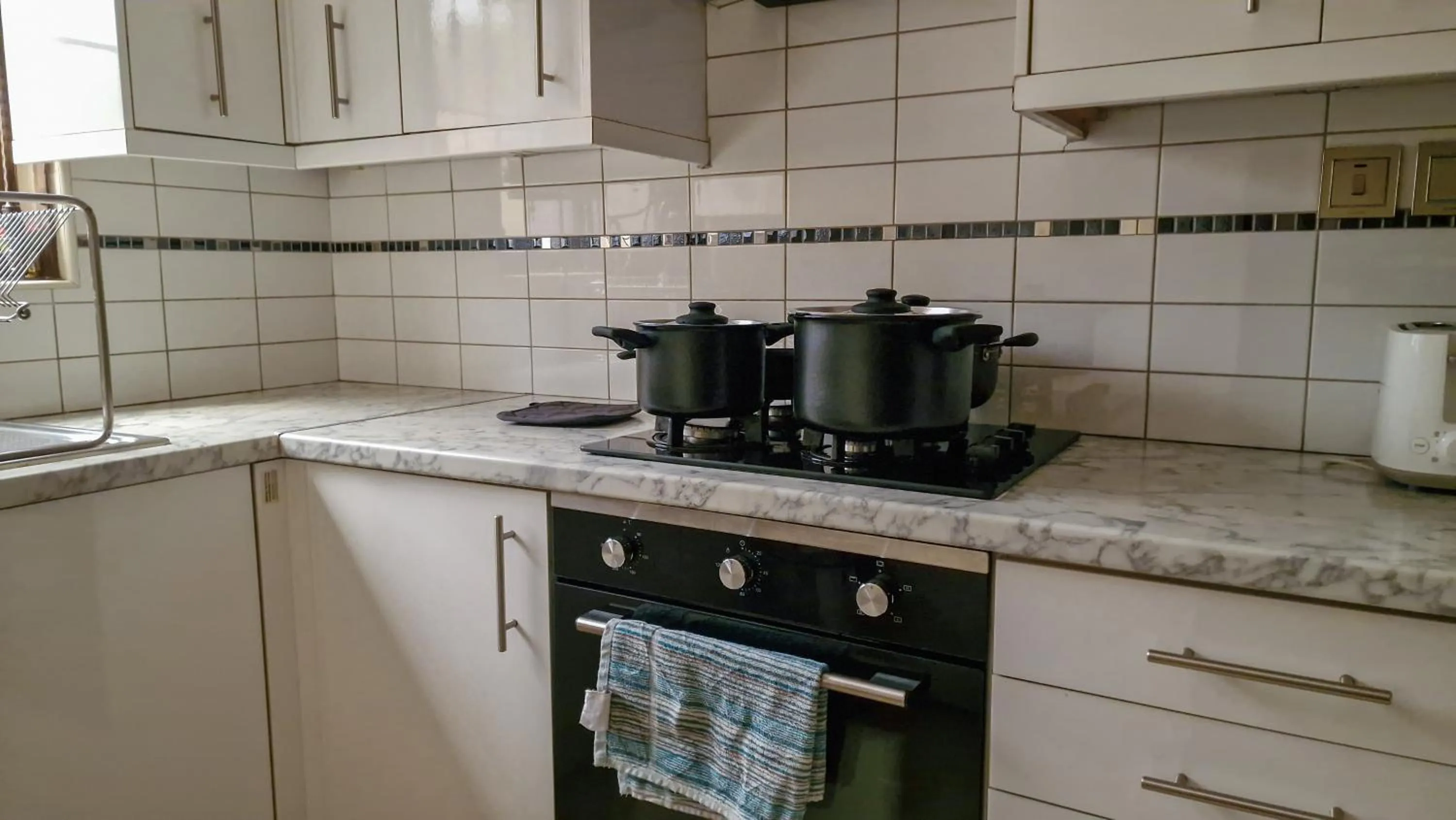 Kitchen or kitchenette in Eric Wilkins Apartments