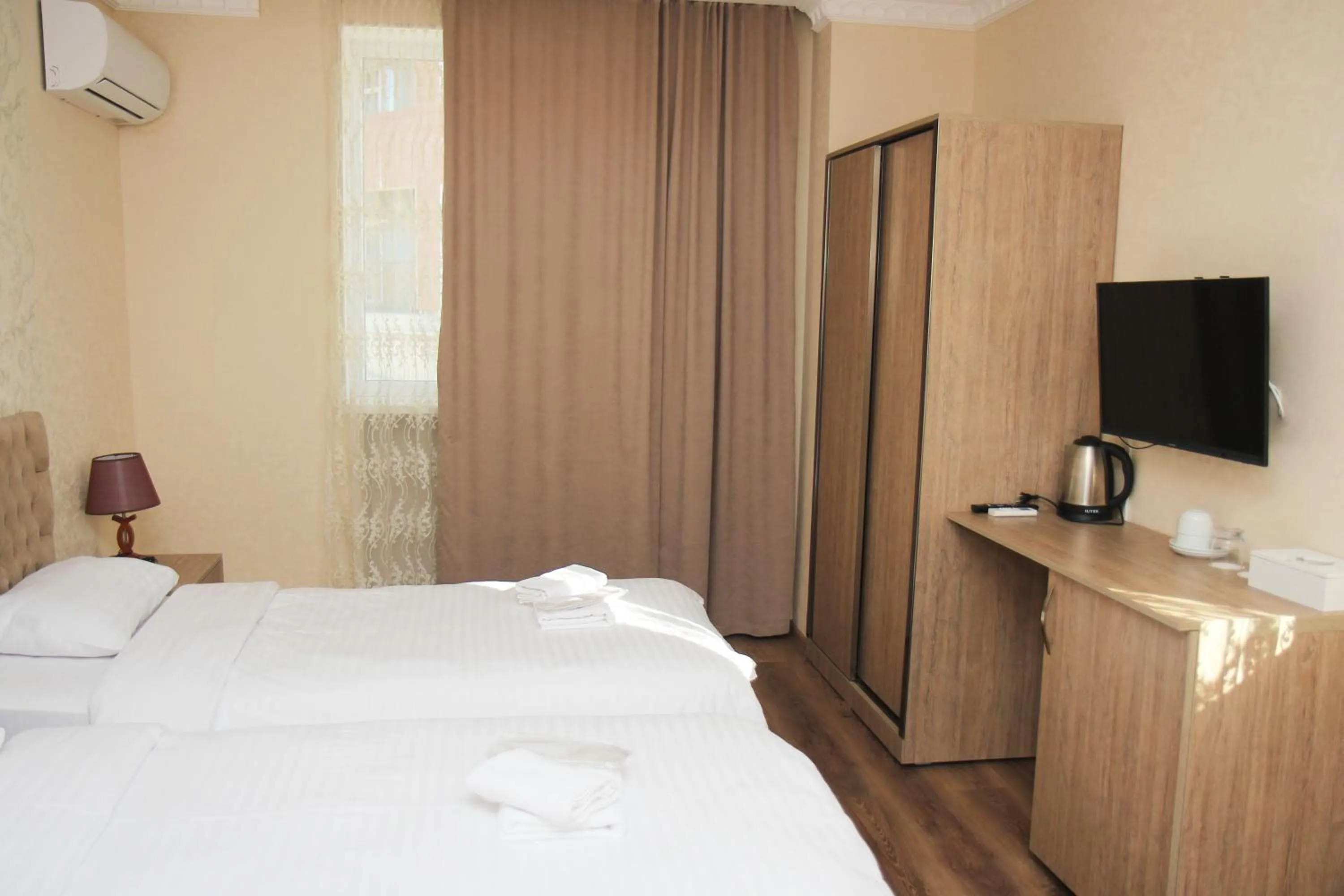 Bed in Boutique Hotel Dany