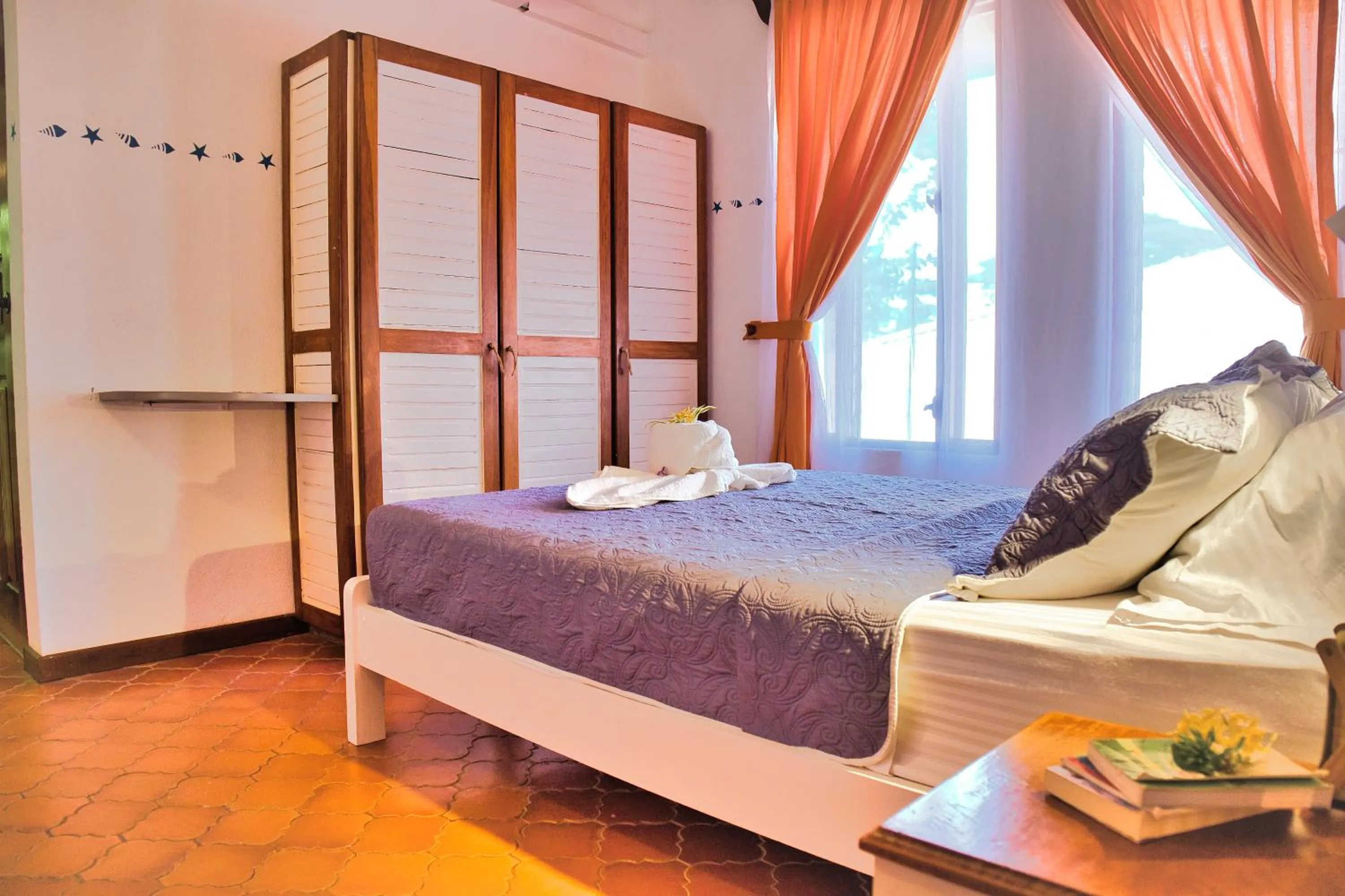 Bed in Samara Pacific Lodge