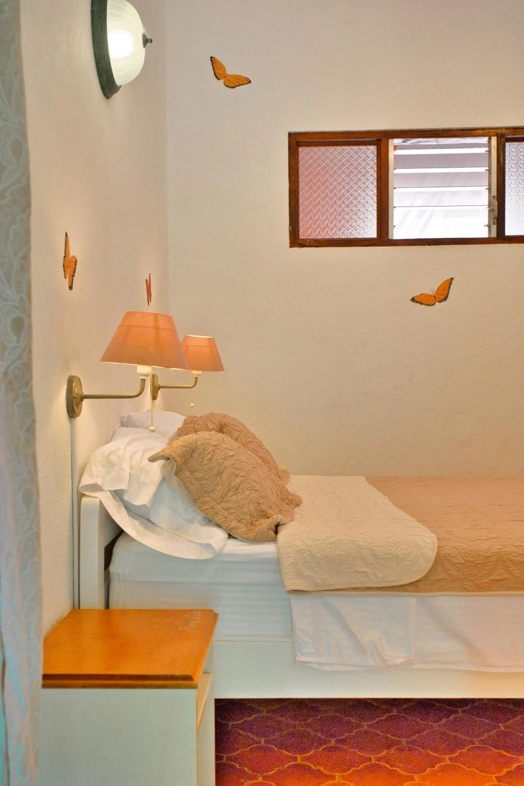 Bed in Samara Pacific Lodge