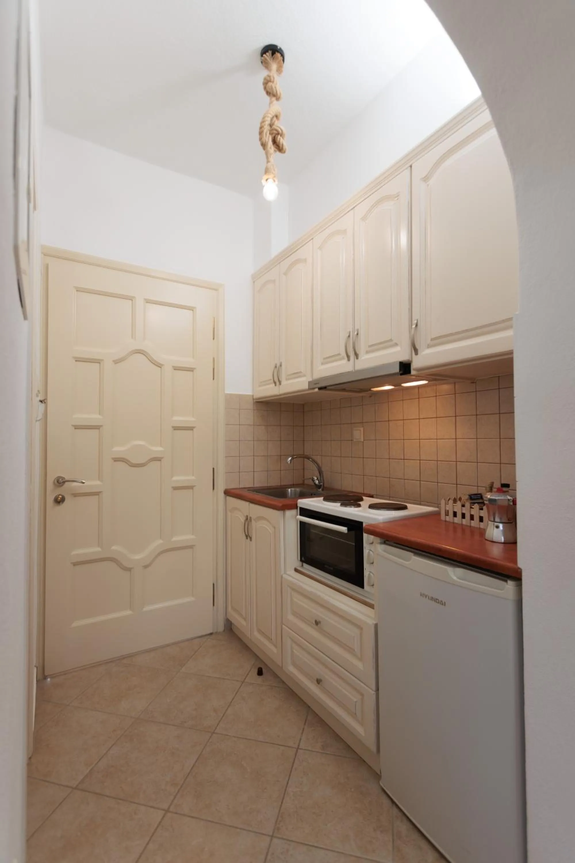 kitchen in Maria's Rooms & Studios