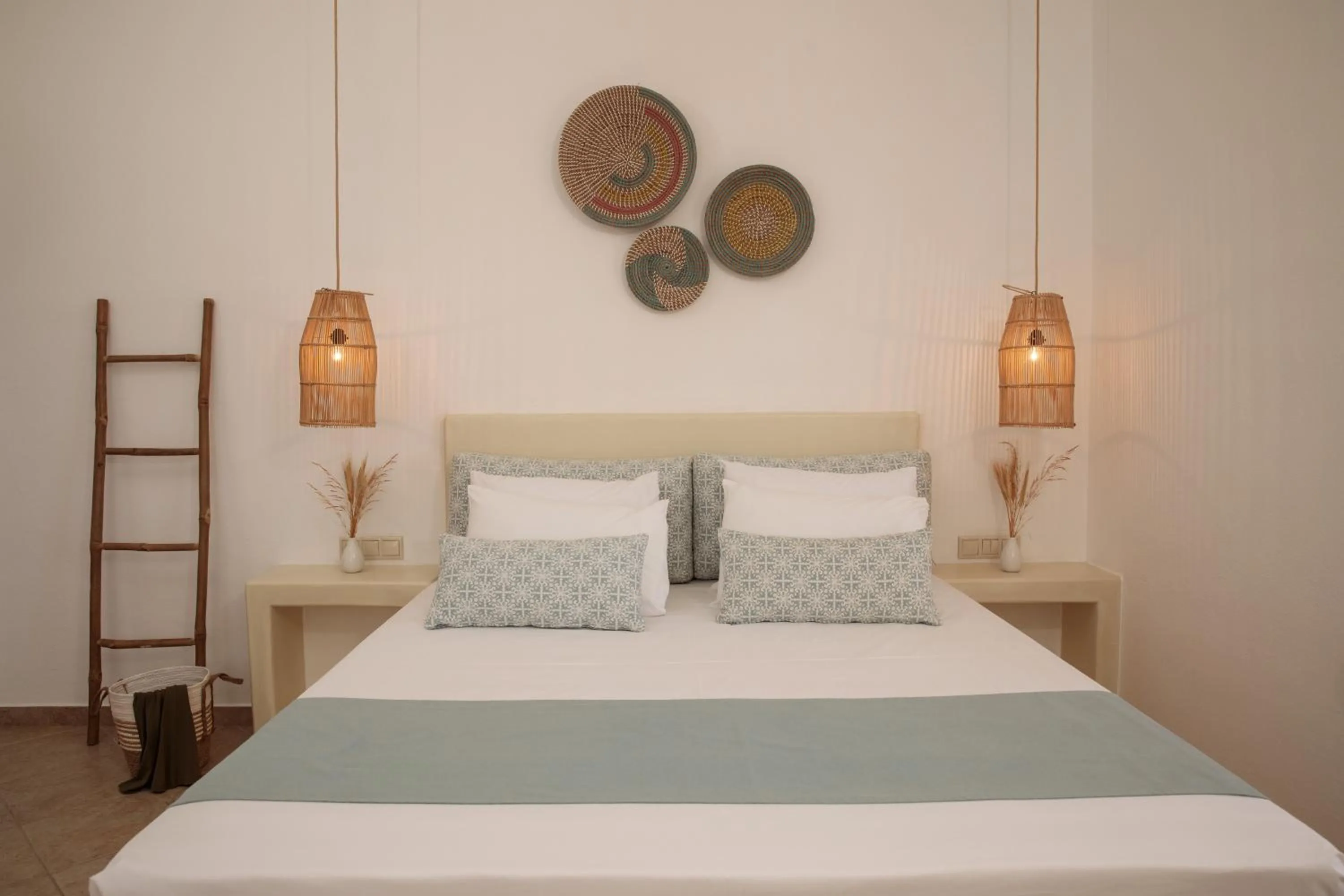Bed in Maria's Rooms & Studios
