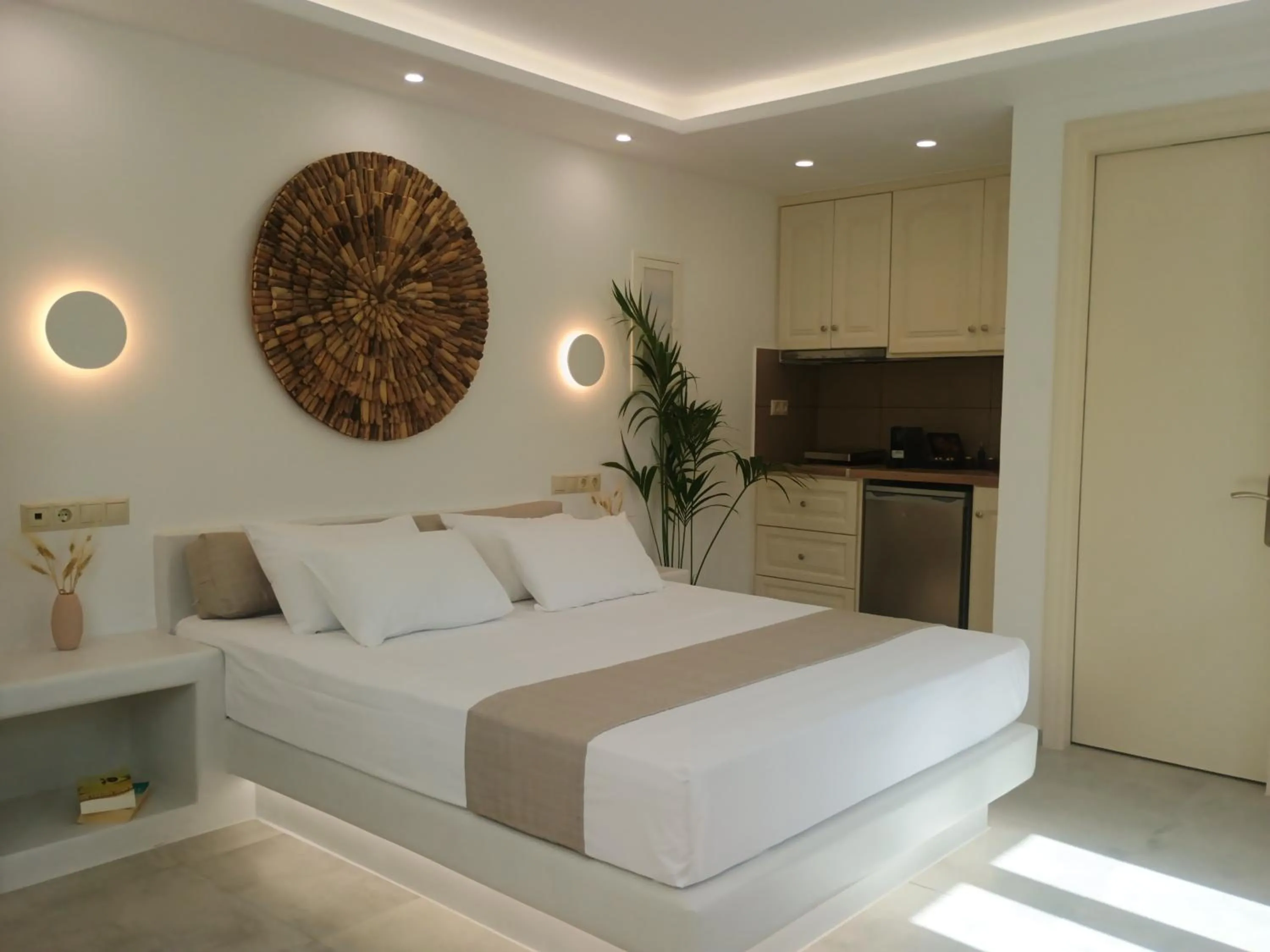 Bed in Maria's Rooms & Studios