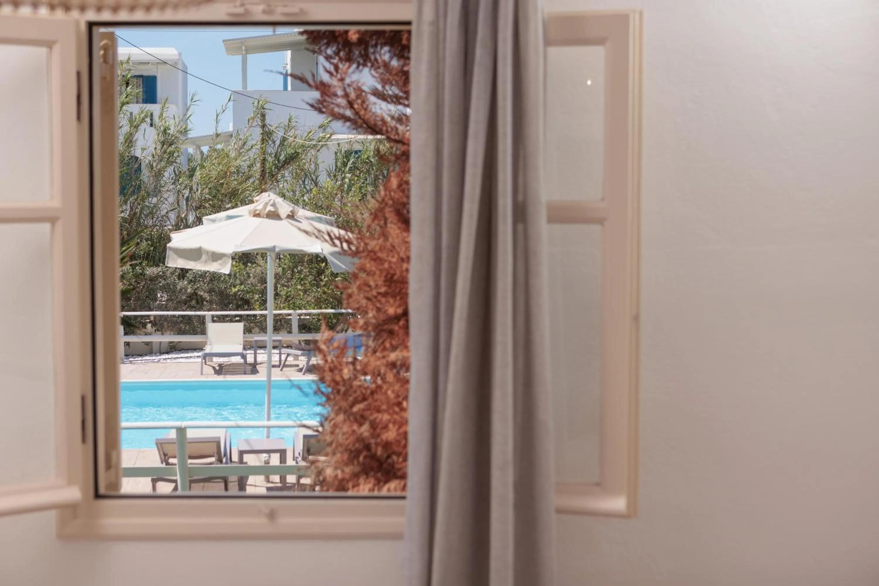 Pool view in Maria's Rooms & Studios