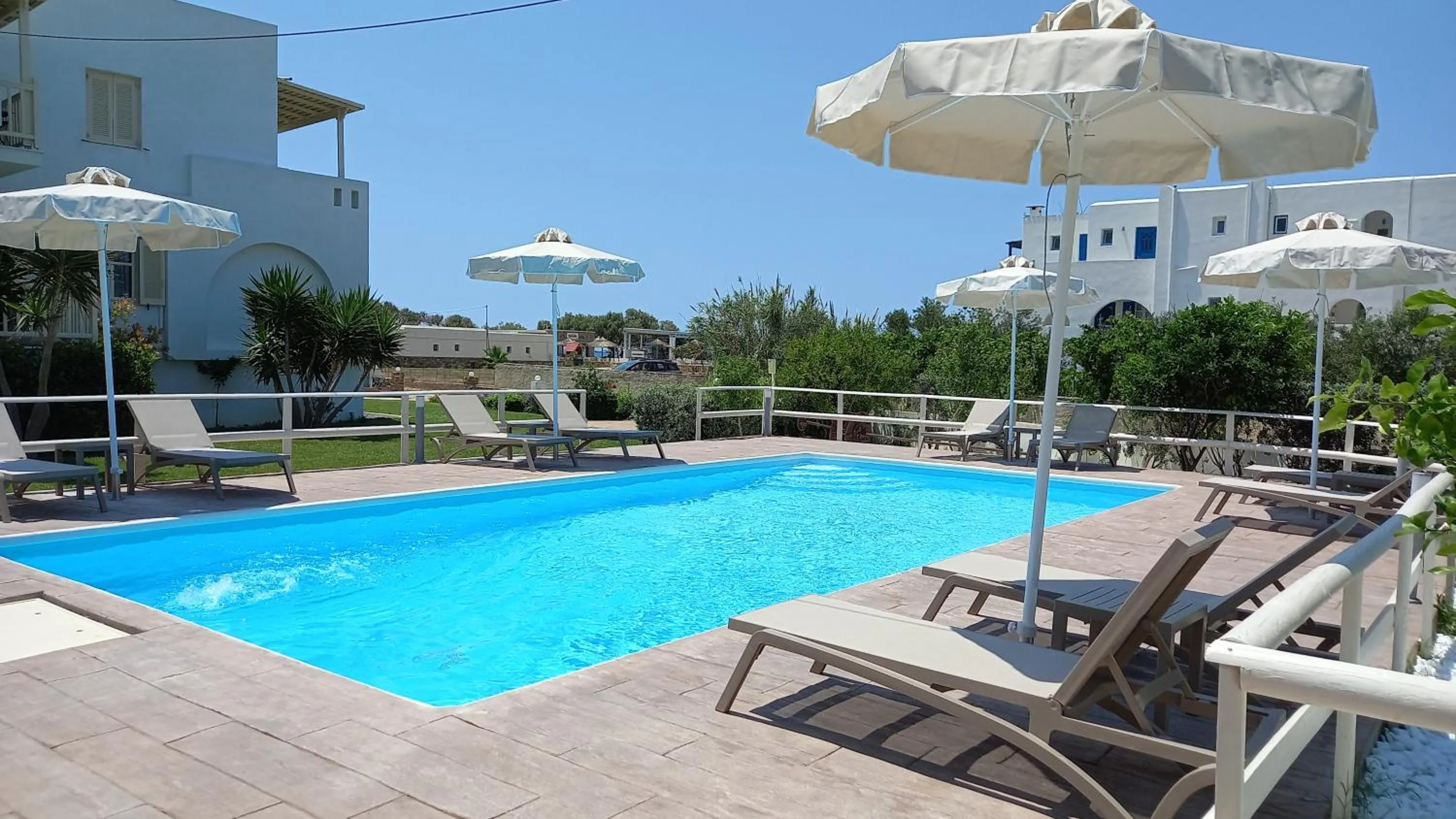 Swimming pool in Maria's Rooms & Studios