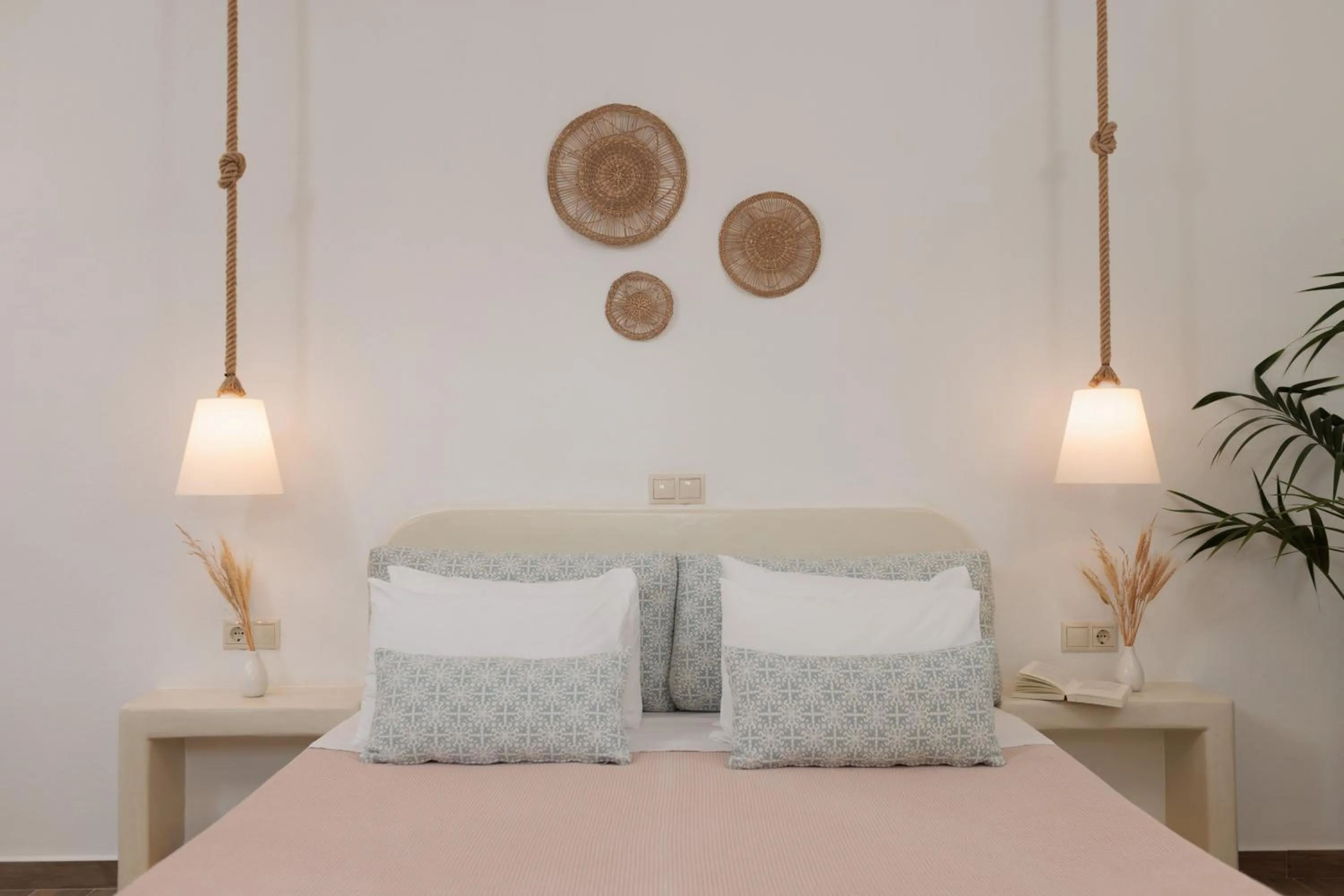 Bed in Maria's Rooms & Studios