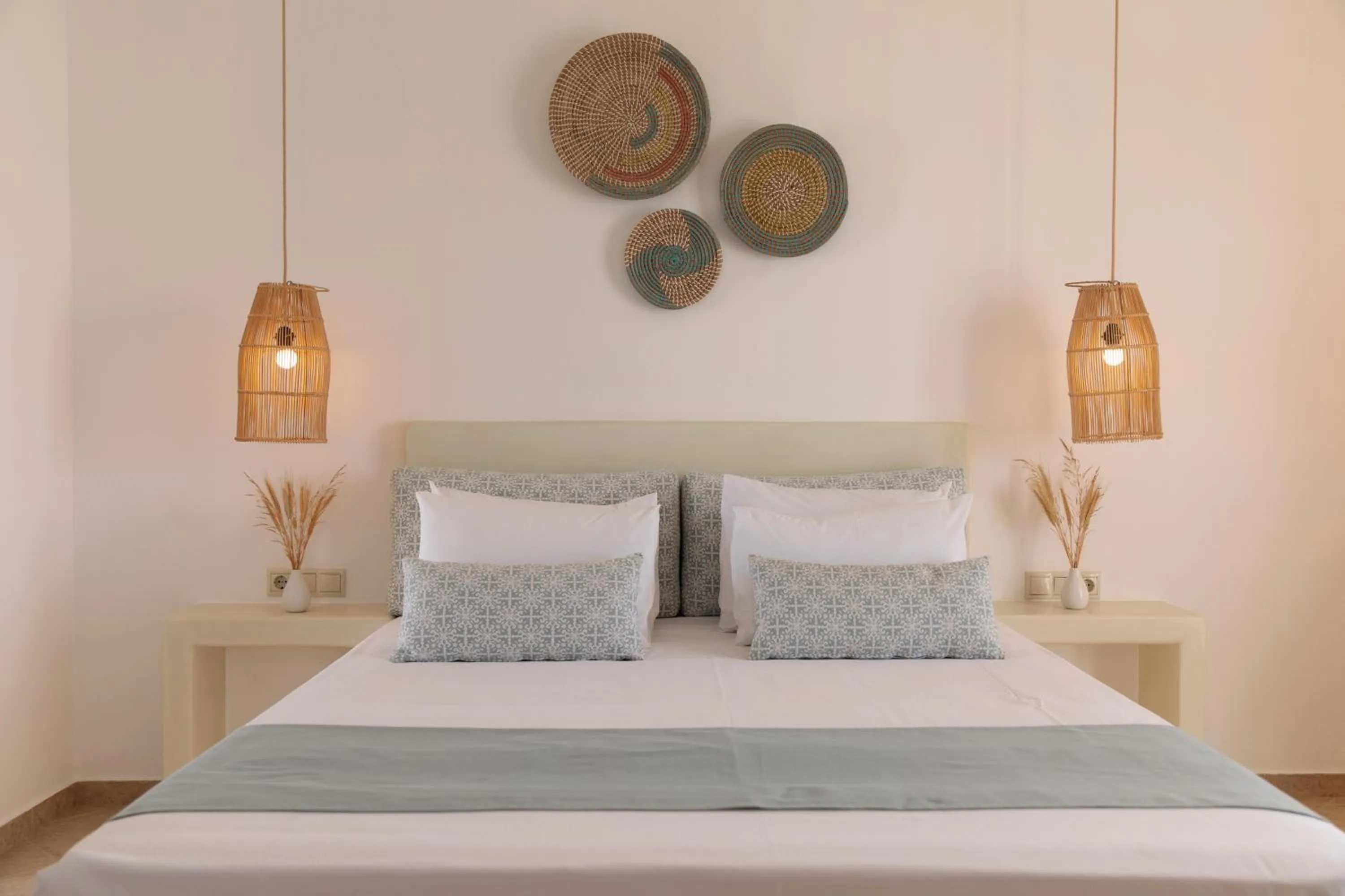 Bed in Maria's Rooms & Studios