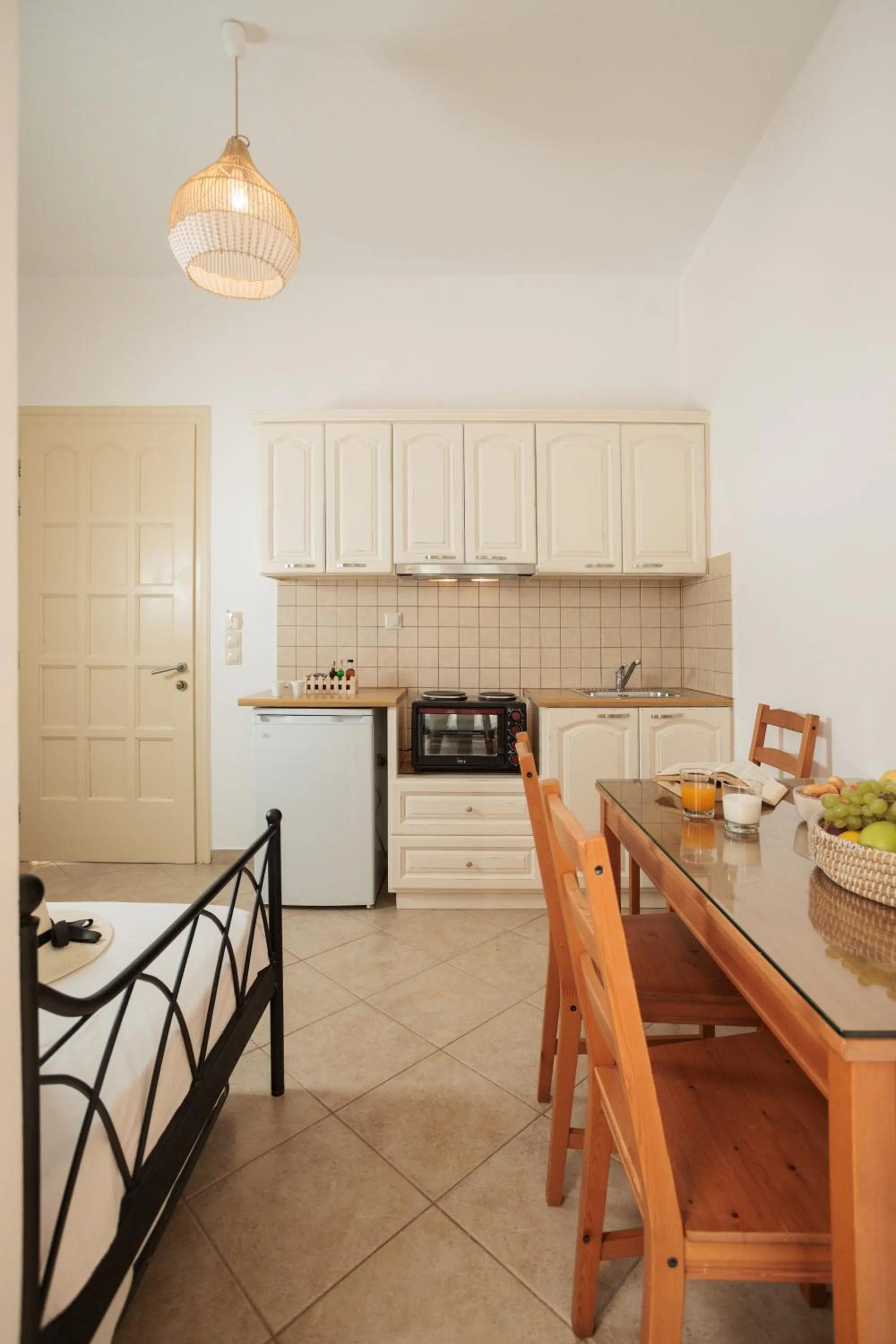 Kitchen or kitchenette in Maria's Rooms & Studios