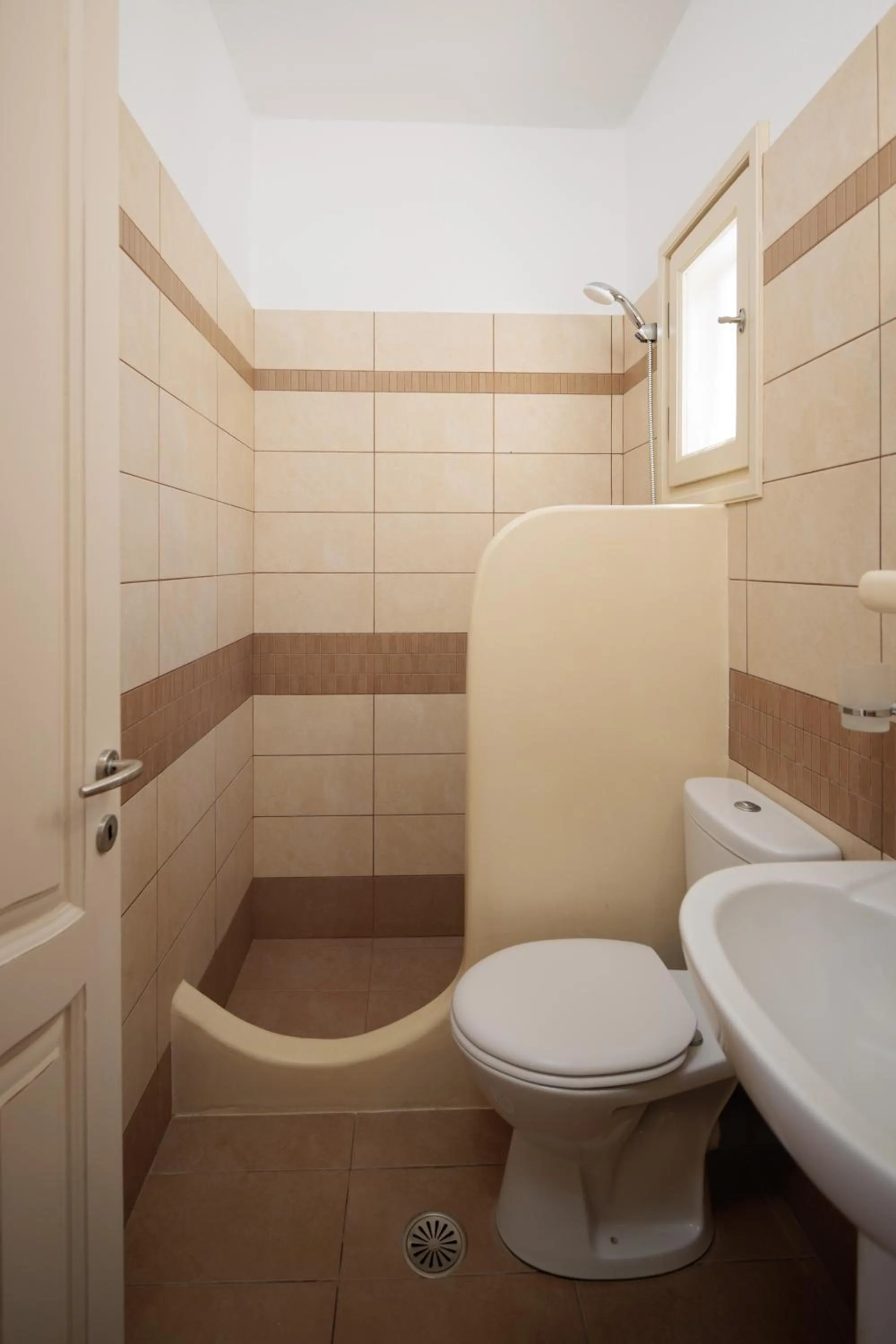 Bathroom in Maria's Rooms & Studios