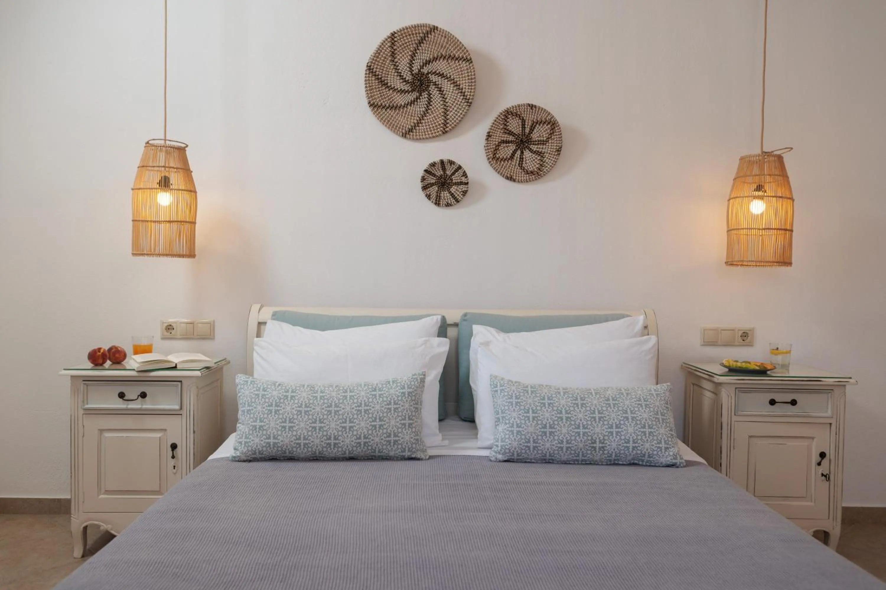 Bed in Maria's Rooms & Studios