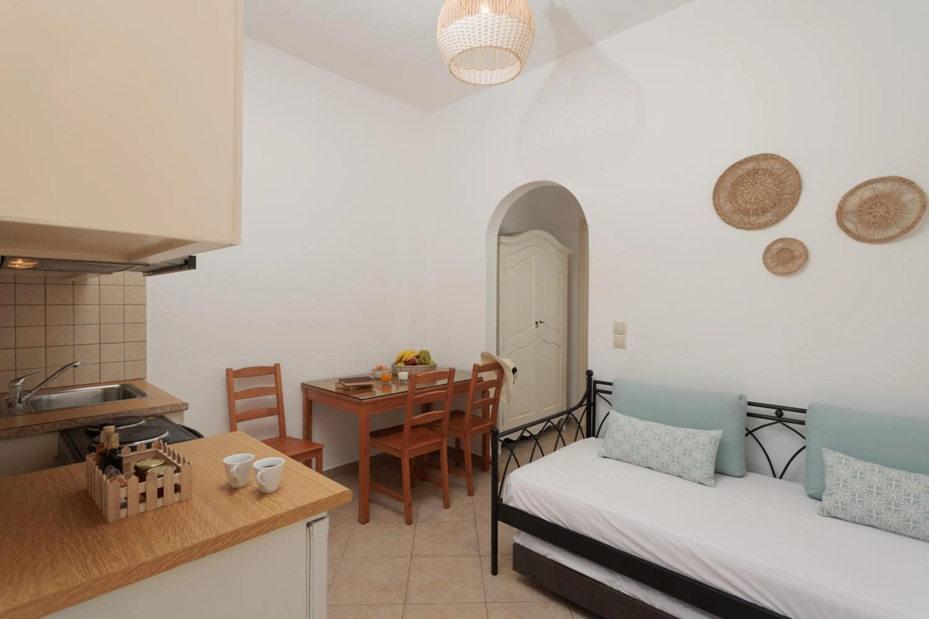 Seating area, Bed in Maria's Rooms & Studios