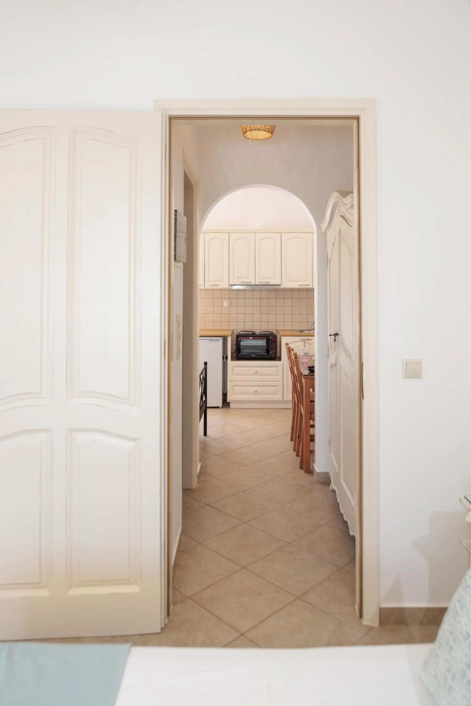 kitchen, Bed in Maria's Rooms & Studios