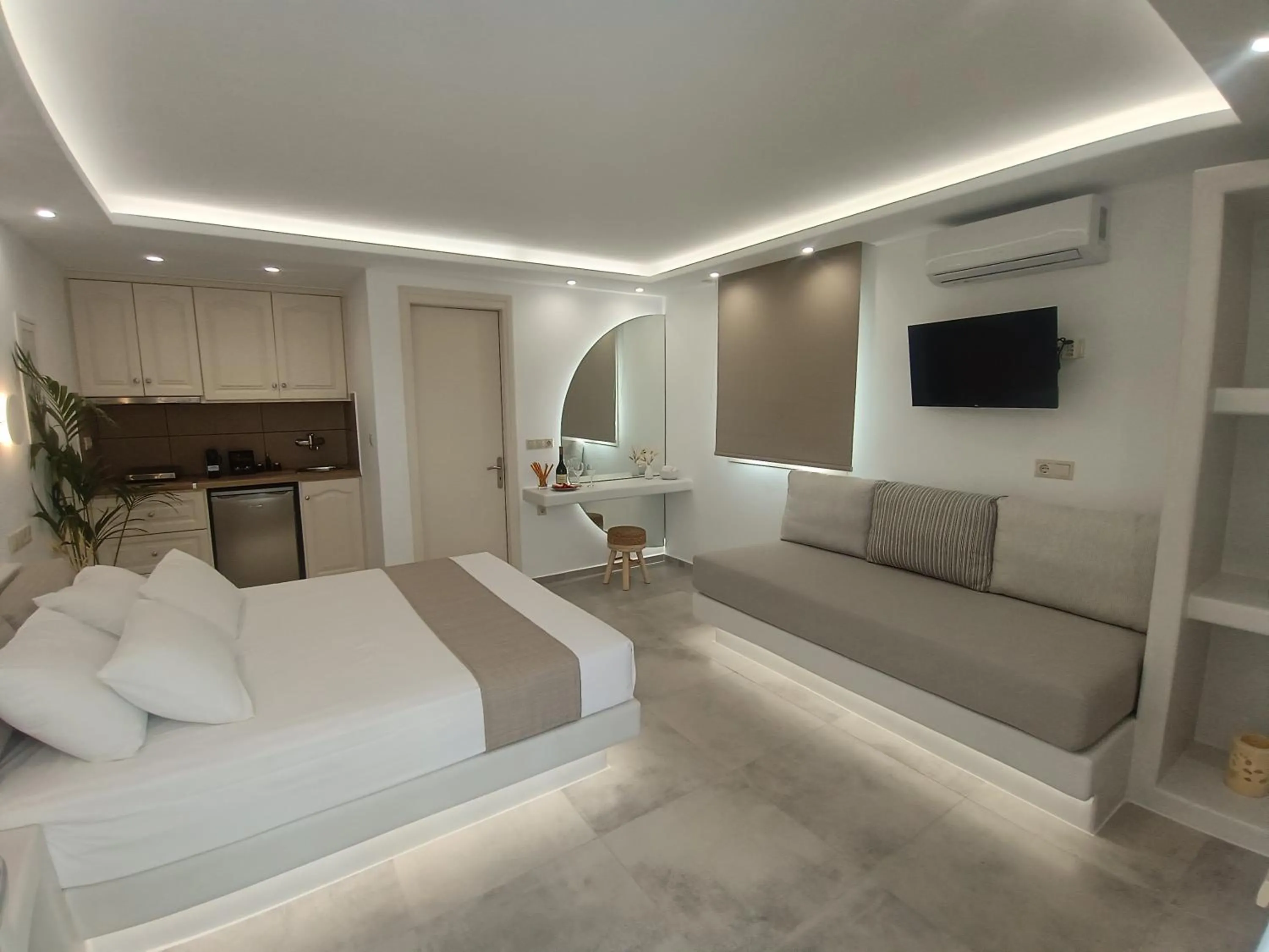 Bed in Maria's Rooms & Studios