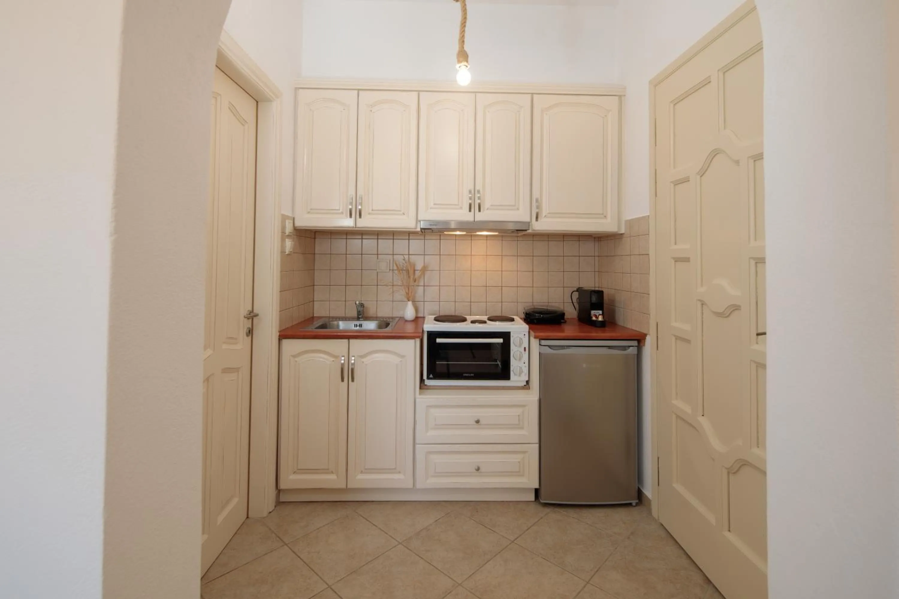 kitchen in Maria's Rooms & Studios