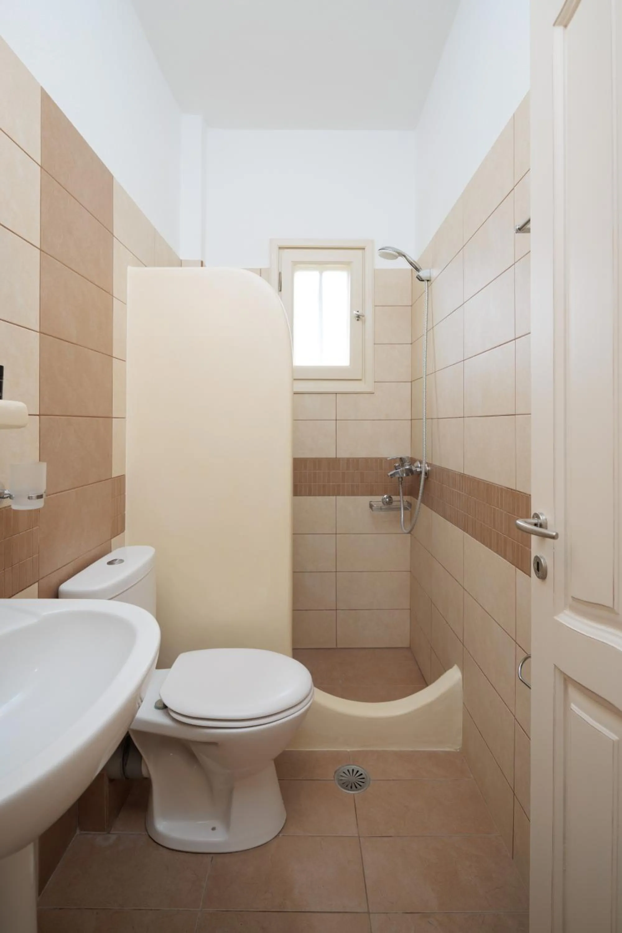 Toilet in Maria's Rooms & Studios