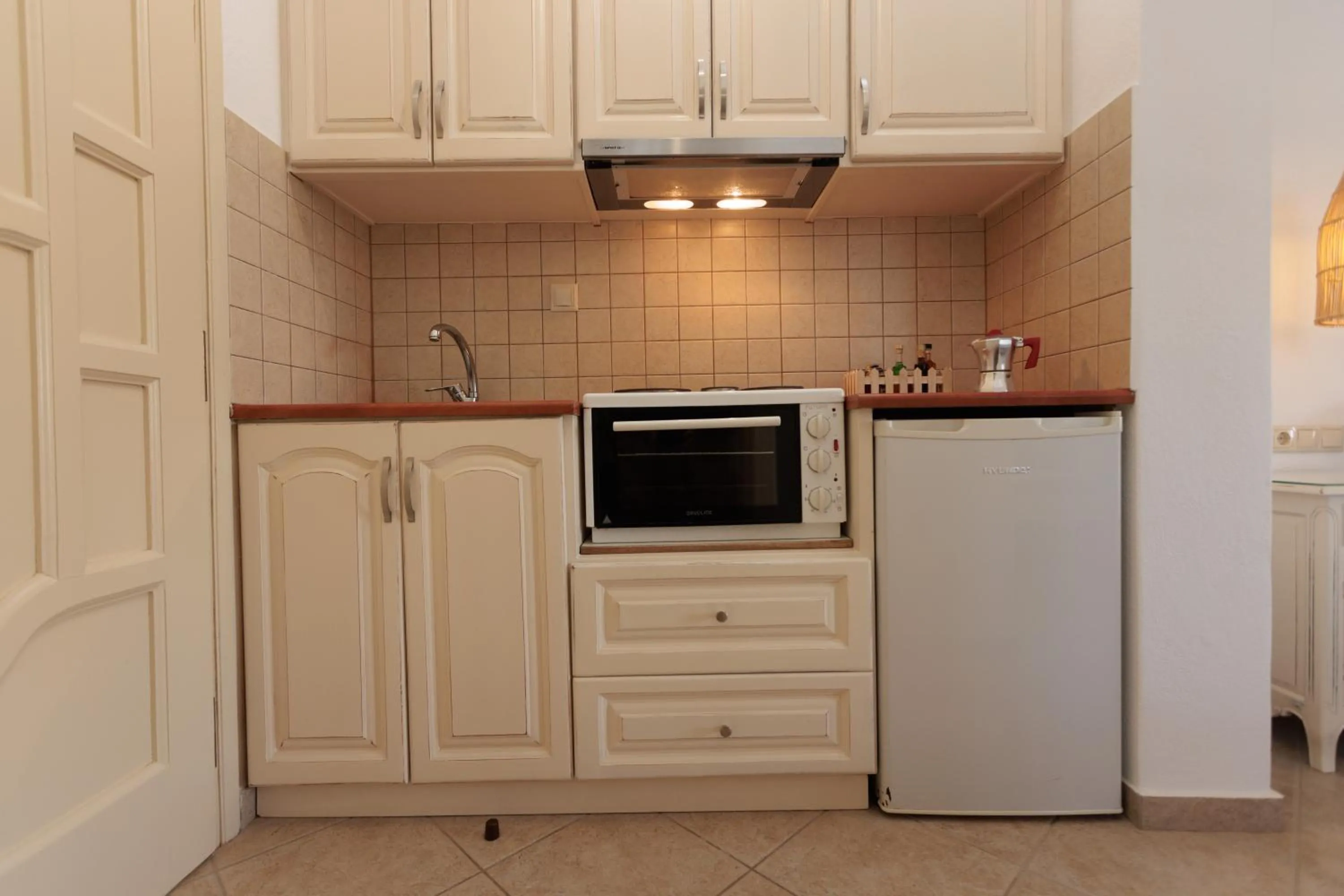 kitchen in Maria's Rooms & Studios
