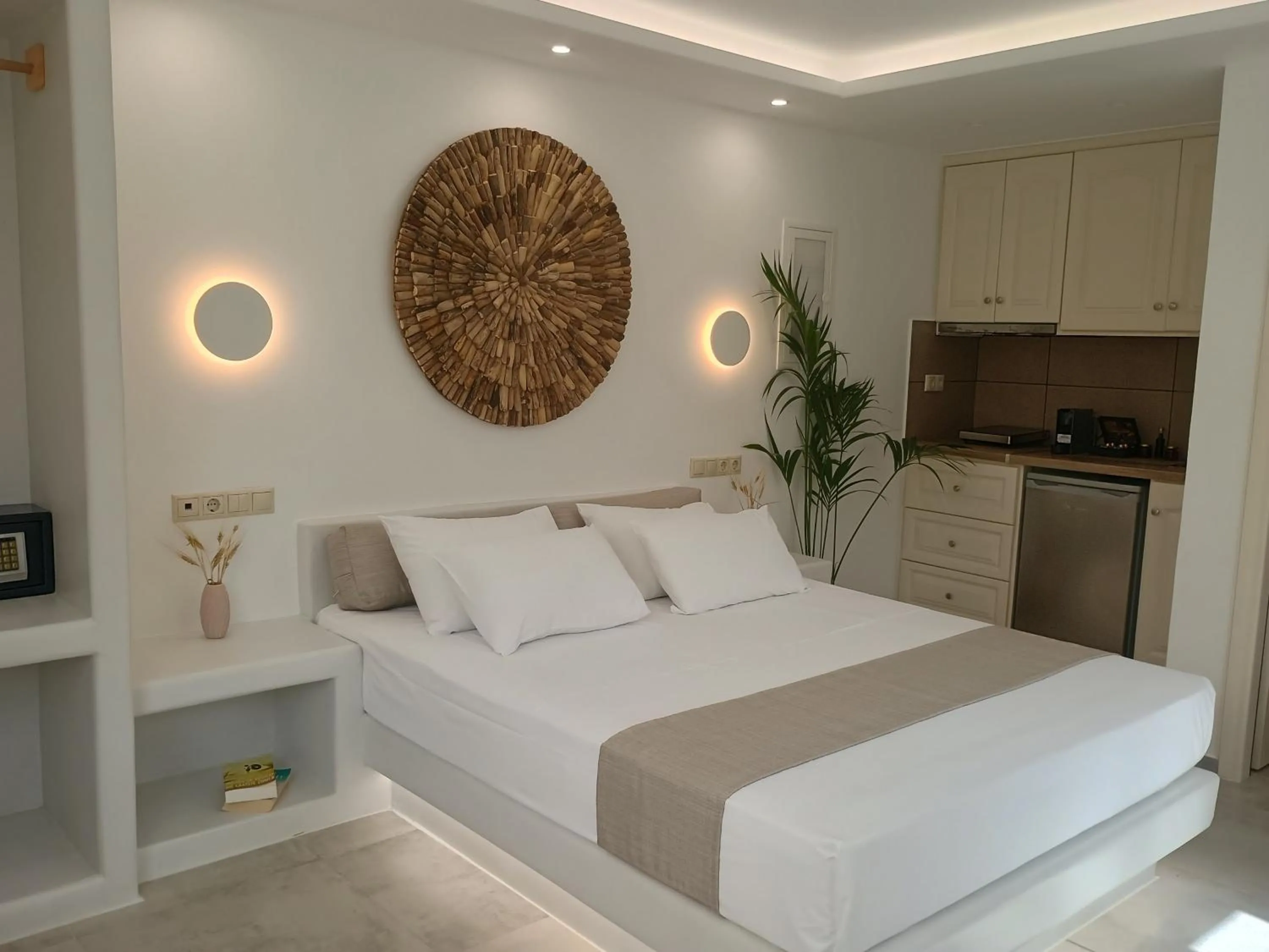 Bed in Maria's Rooms & Studios