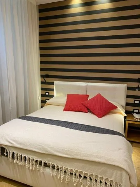 Bed in Kbirr Charming House