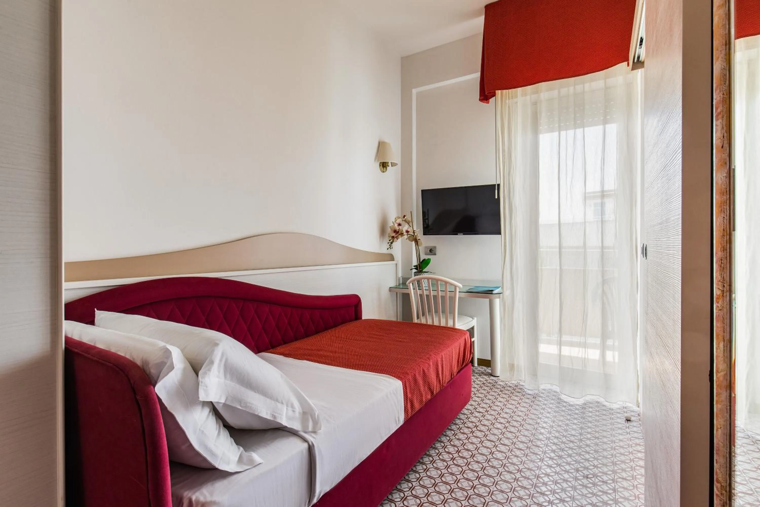 Bed in Hotel Caravelle