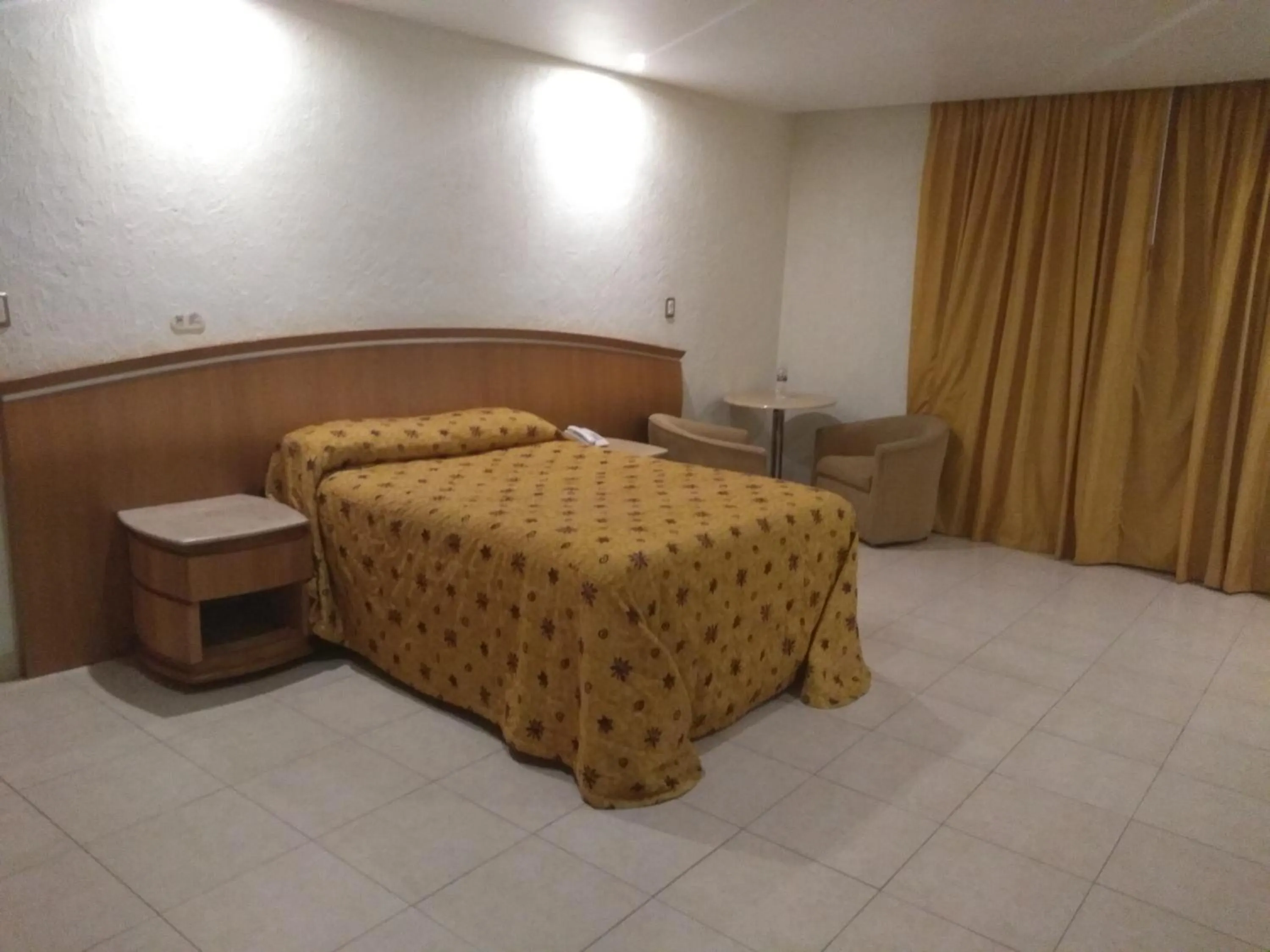 Bed in Hotel Jiménez Plaza