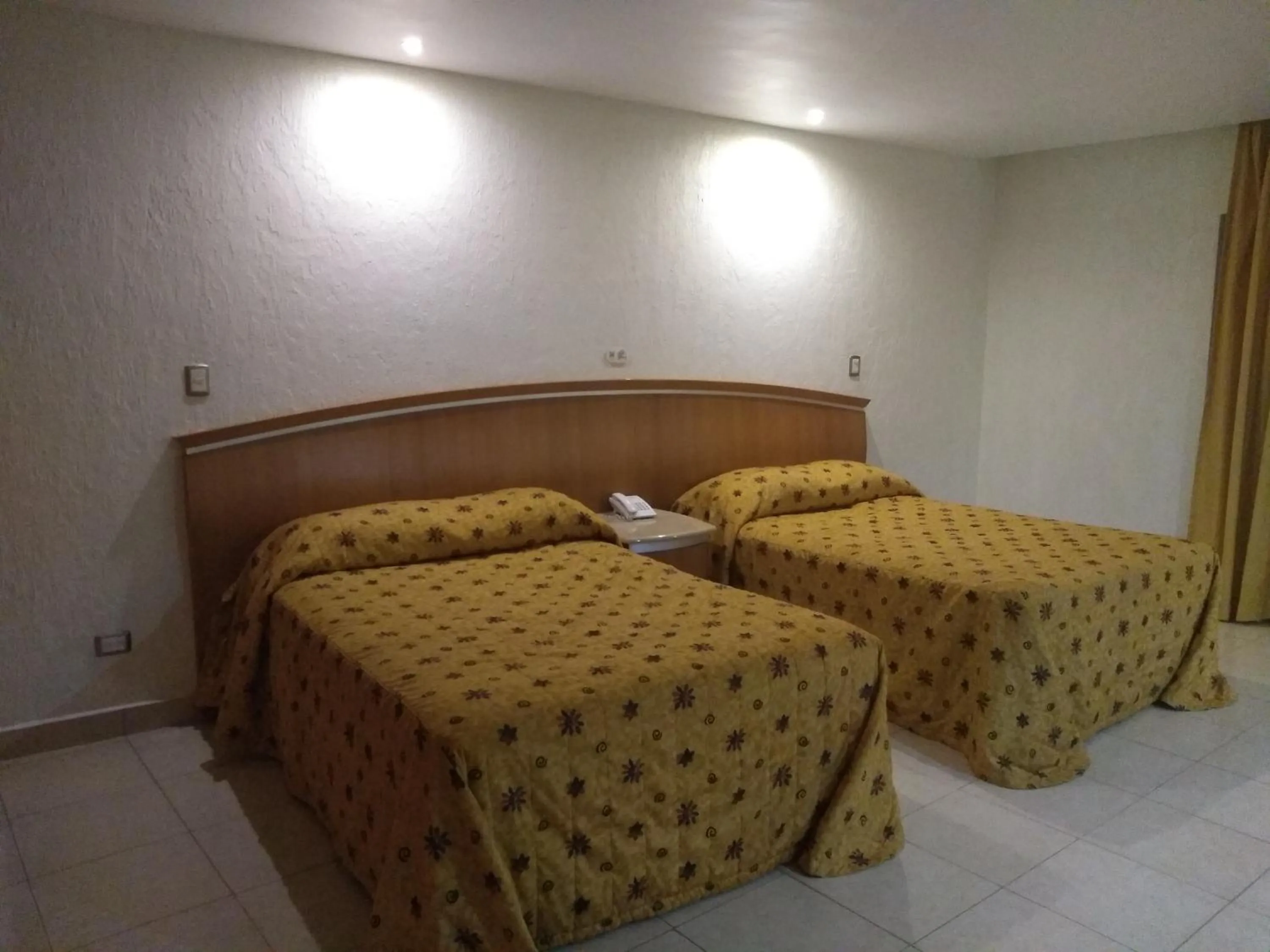 Bed in Hotel Jiménez Plaza