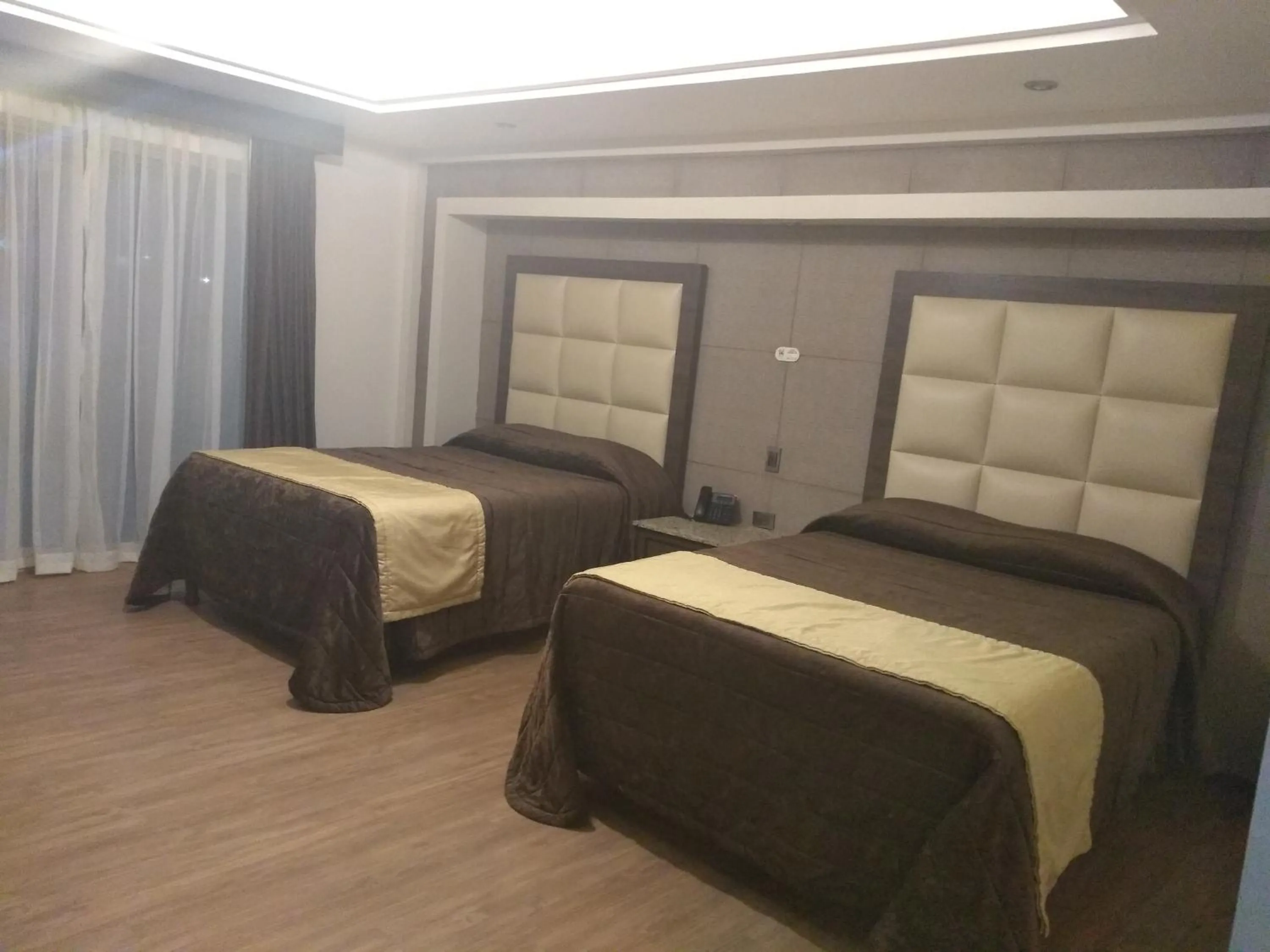 Bed in Hotel Jiménez Plaza