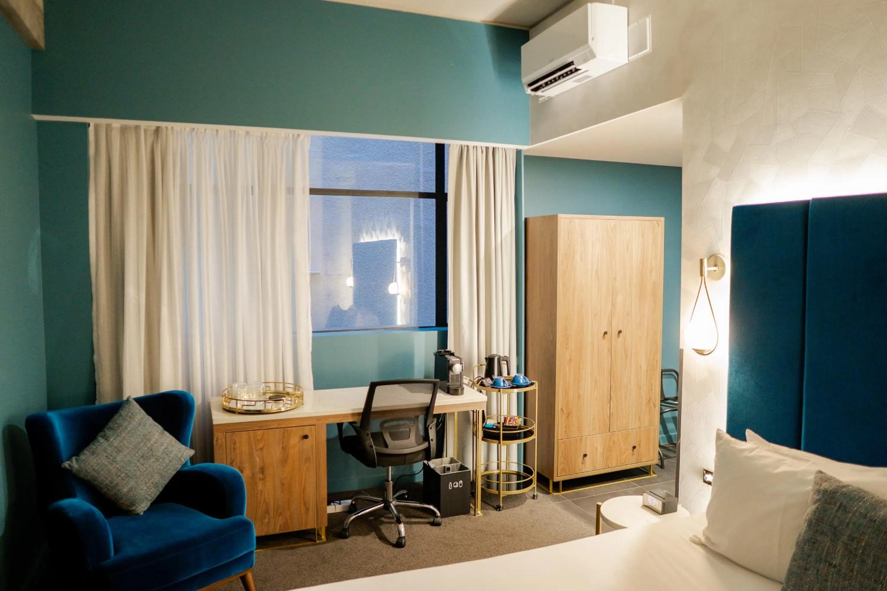 Seating area in The Muse Christchurch Art Hotel