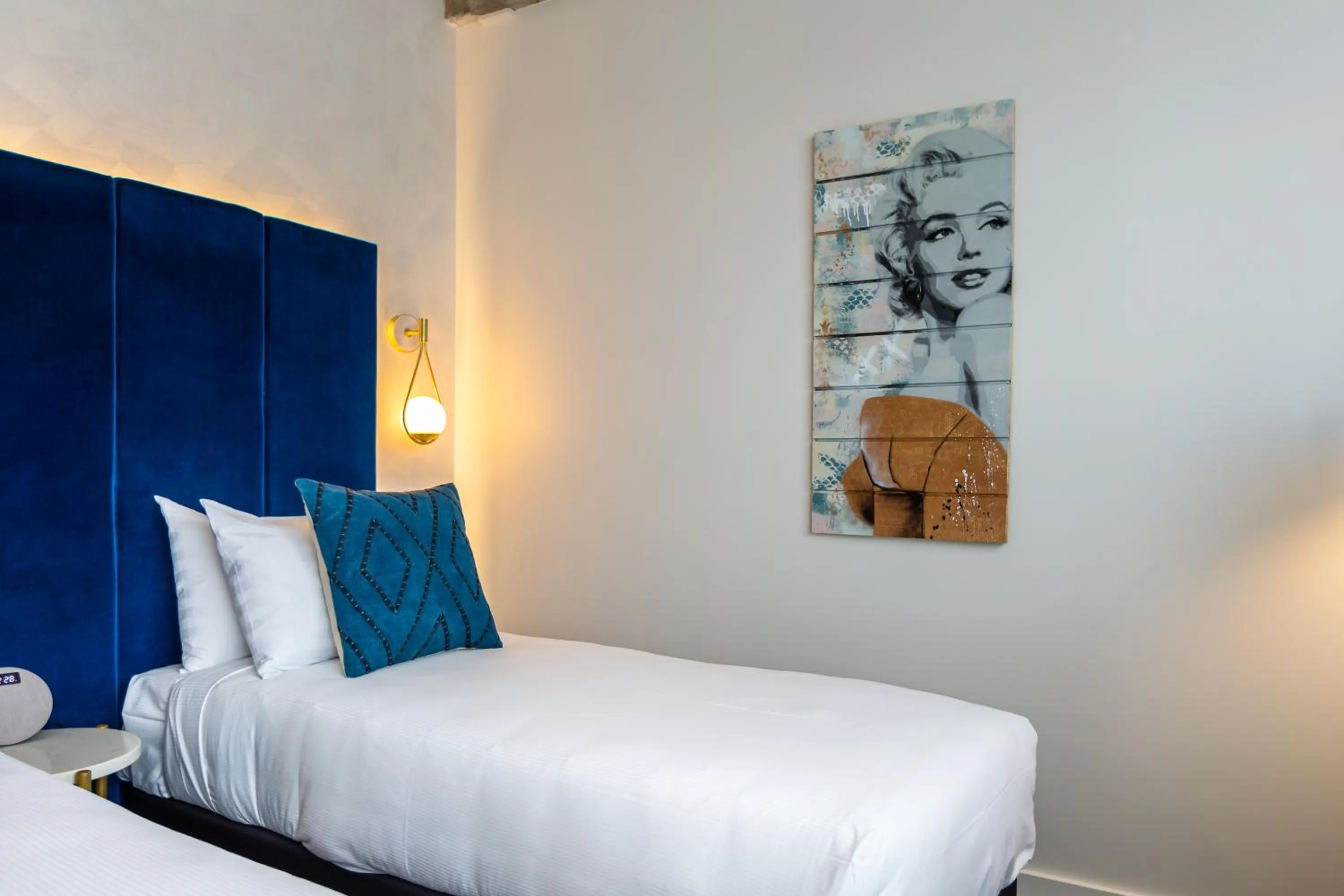 Decorative detail, Bed in The Muse Christchurch Art Hotel