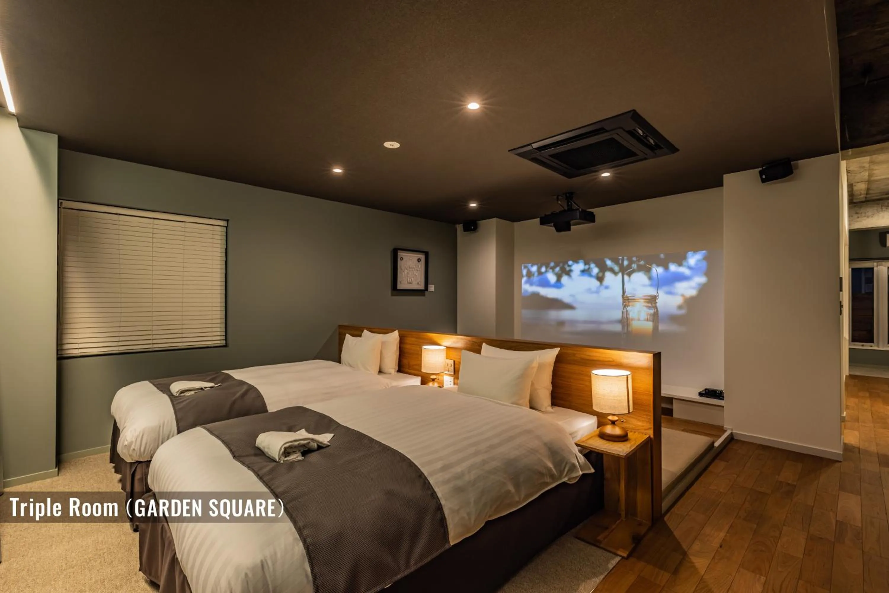 Bedroom, Bed in ビル泊 -Birupaku Decentralized Hotel-