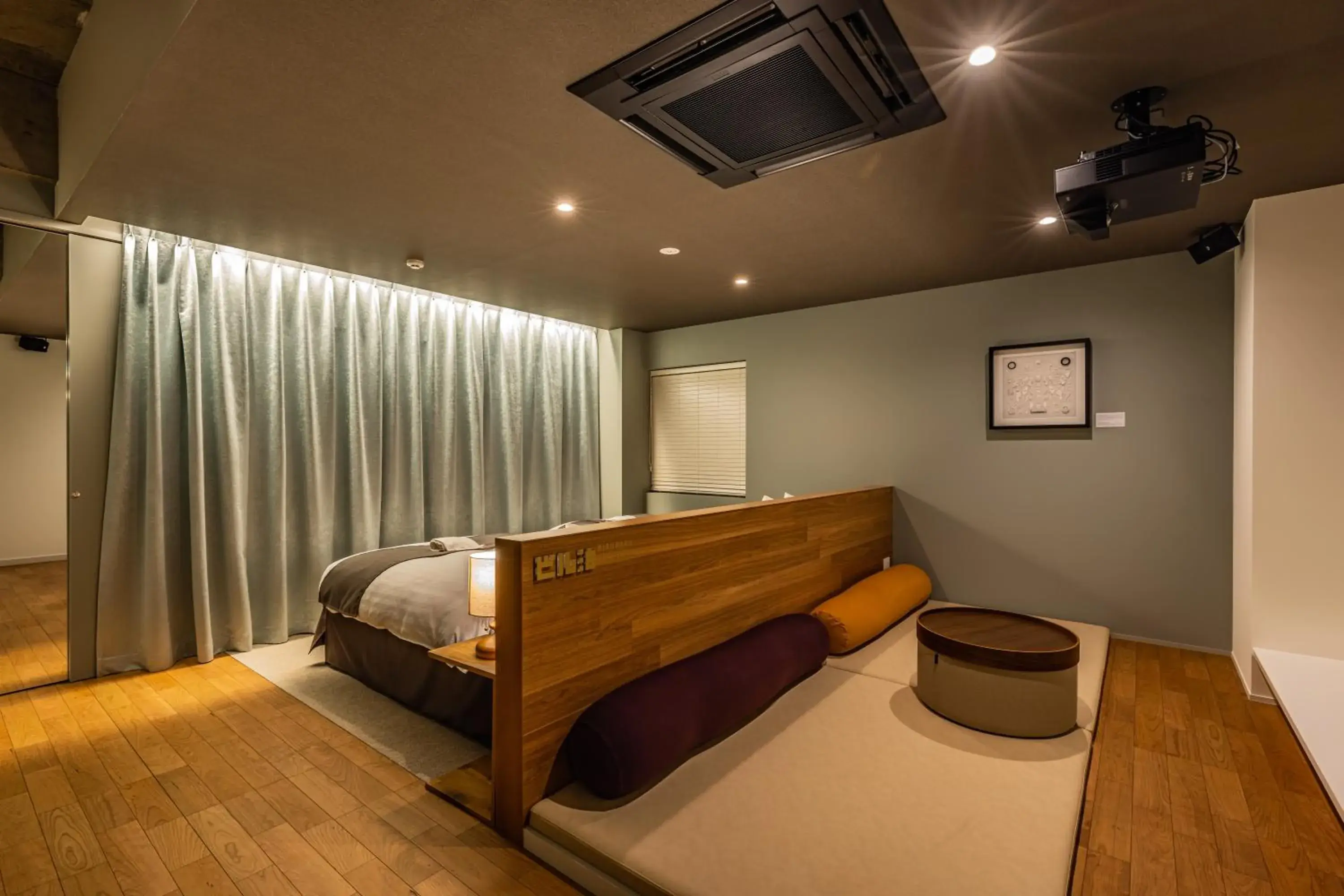 Living room, Bed in ビル泊 -Birupaku Decentralized Hotel- Living room, Bed in ビル泊 -Birupaku Decentralized Hotel-