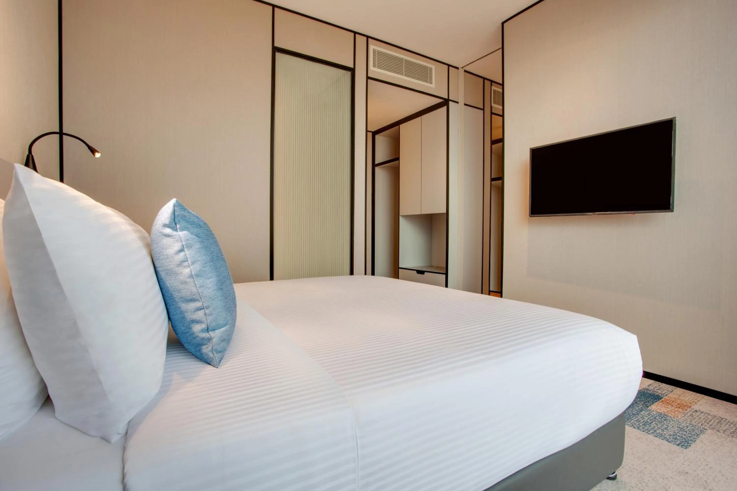 Bed in Lemon Tree Hotel, Jumeirah Dubai