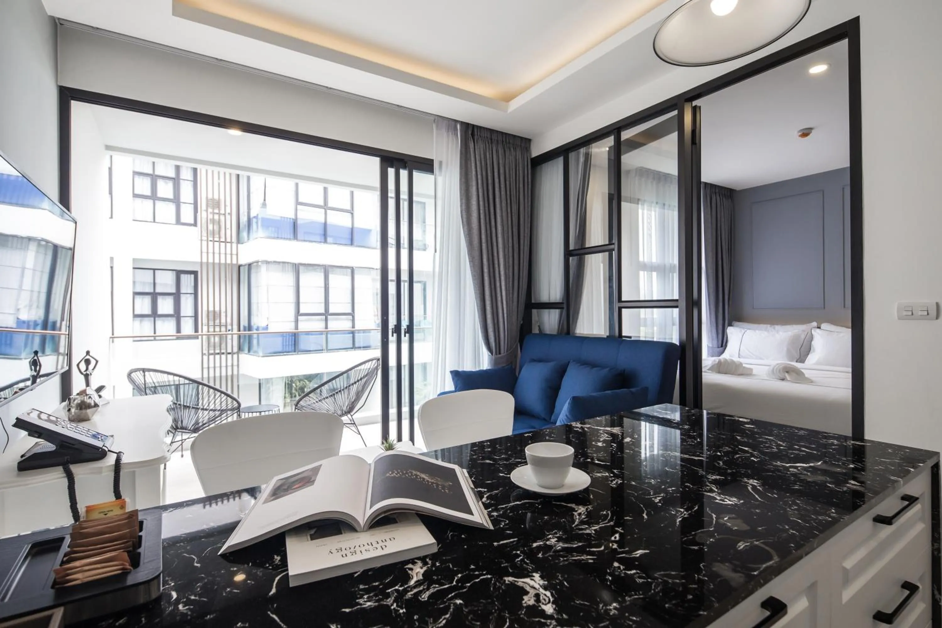 Living room in Palmyrah Surin Beach Residence