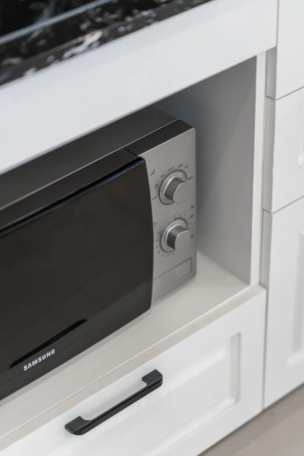 Kitchen or kitchenette in Palmyrah Surin Beach Residence