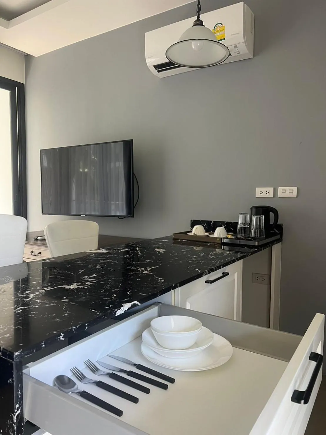 Kitchen or kitchenette in Palmyrah Surin Beach Residence