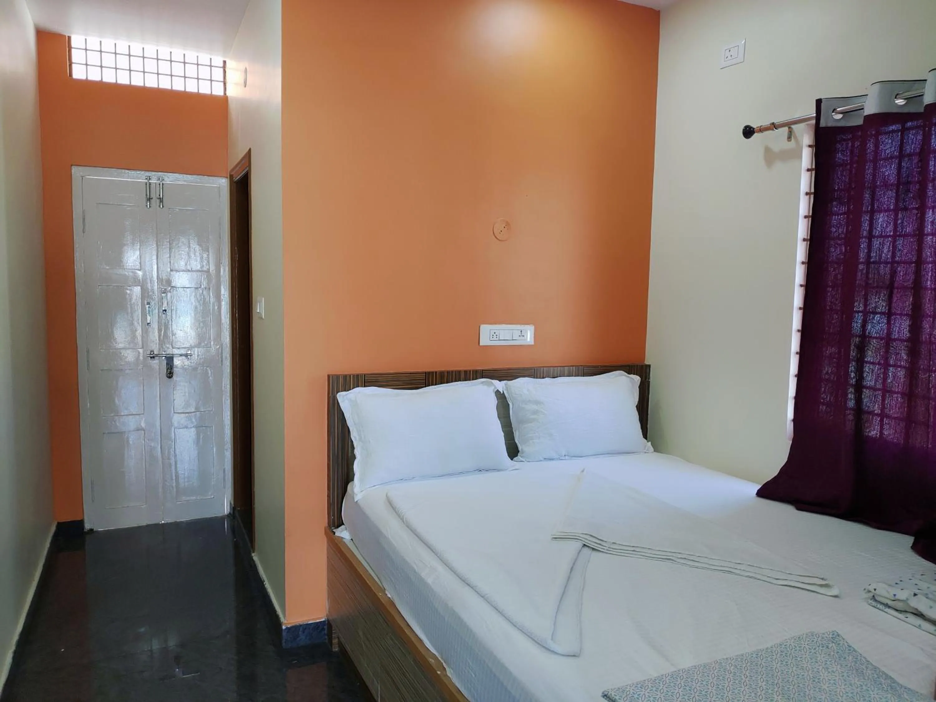 Bed in Hampi Two Bedroom Guesthouse