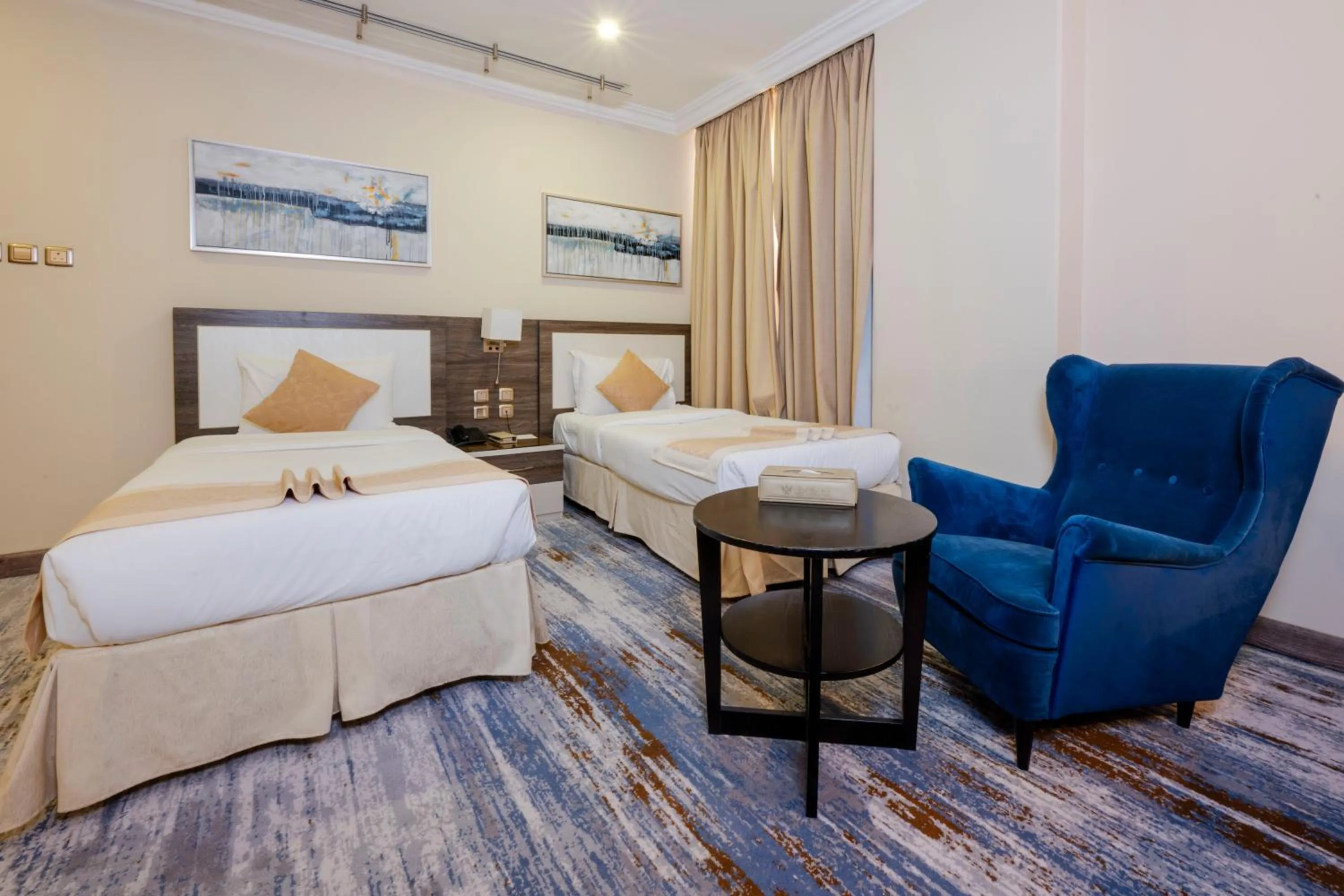 Seating area, Bed in Hayat Al Riyadh Hotel