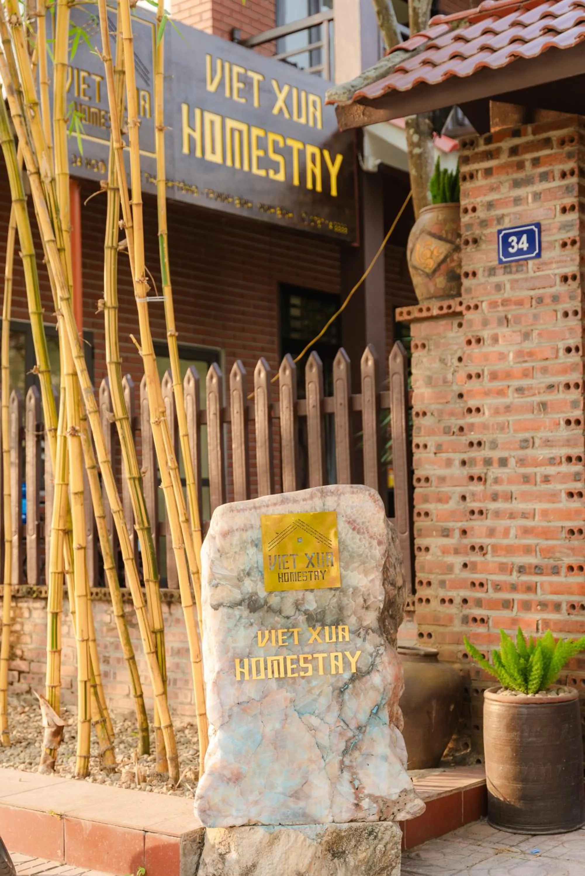 Property logo or sign in Việt Xưa Homestay