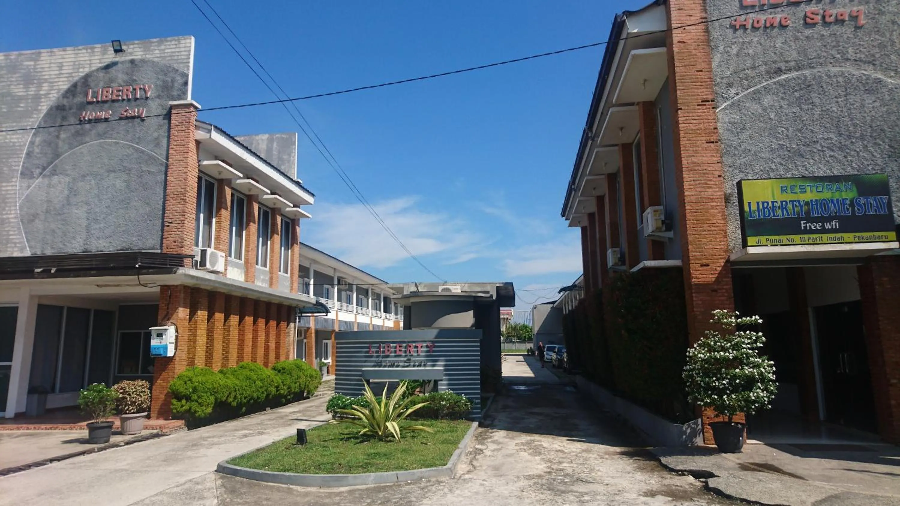 Property logo or sign in Liberty Homestay