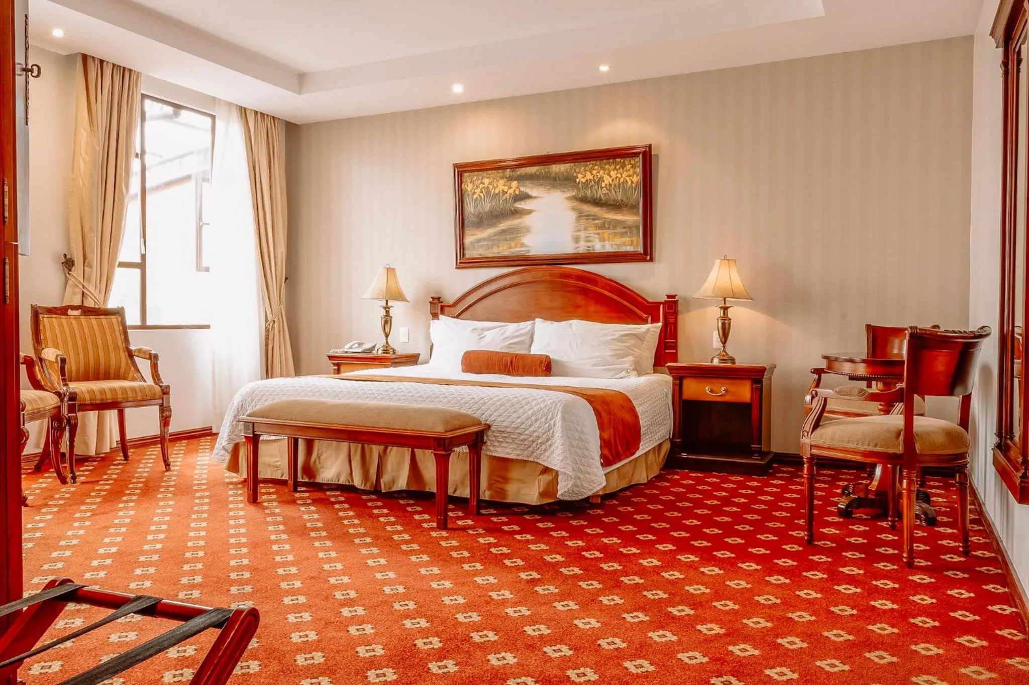 Bed in Grand Victoria Boutique Hotel