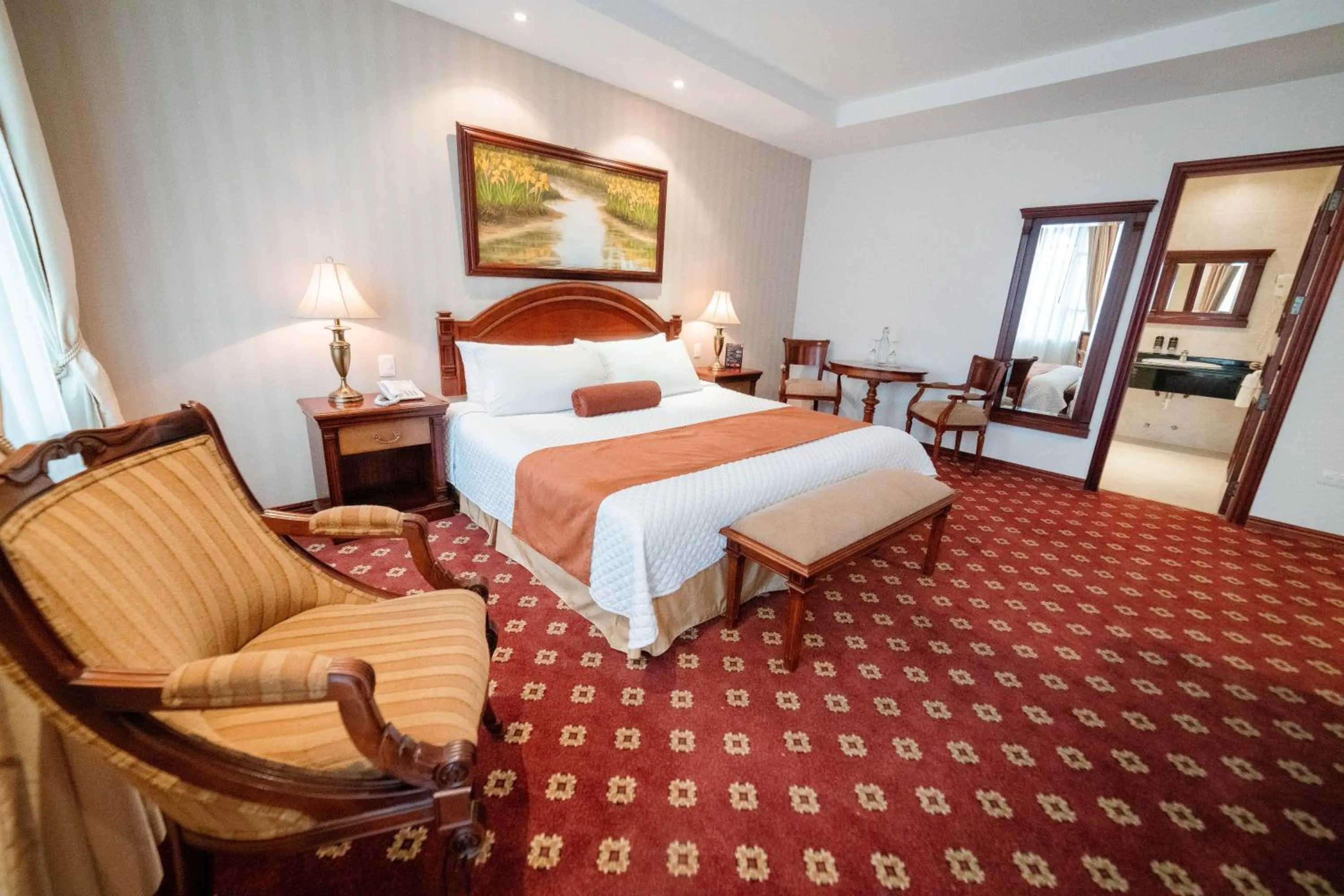 Bed in Grand Victoria Boutique Hotel