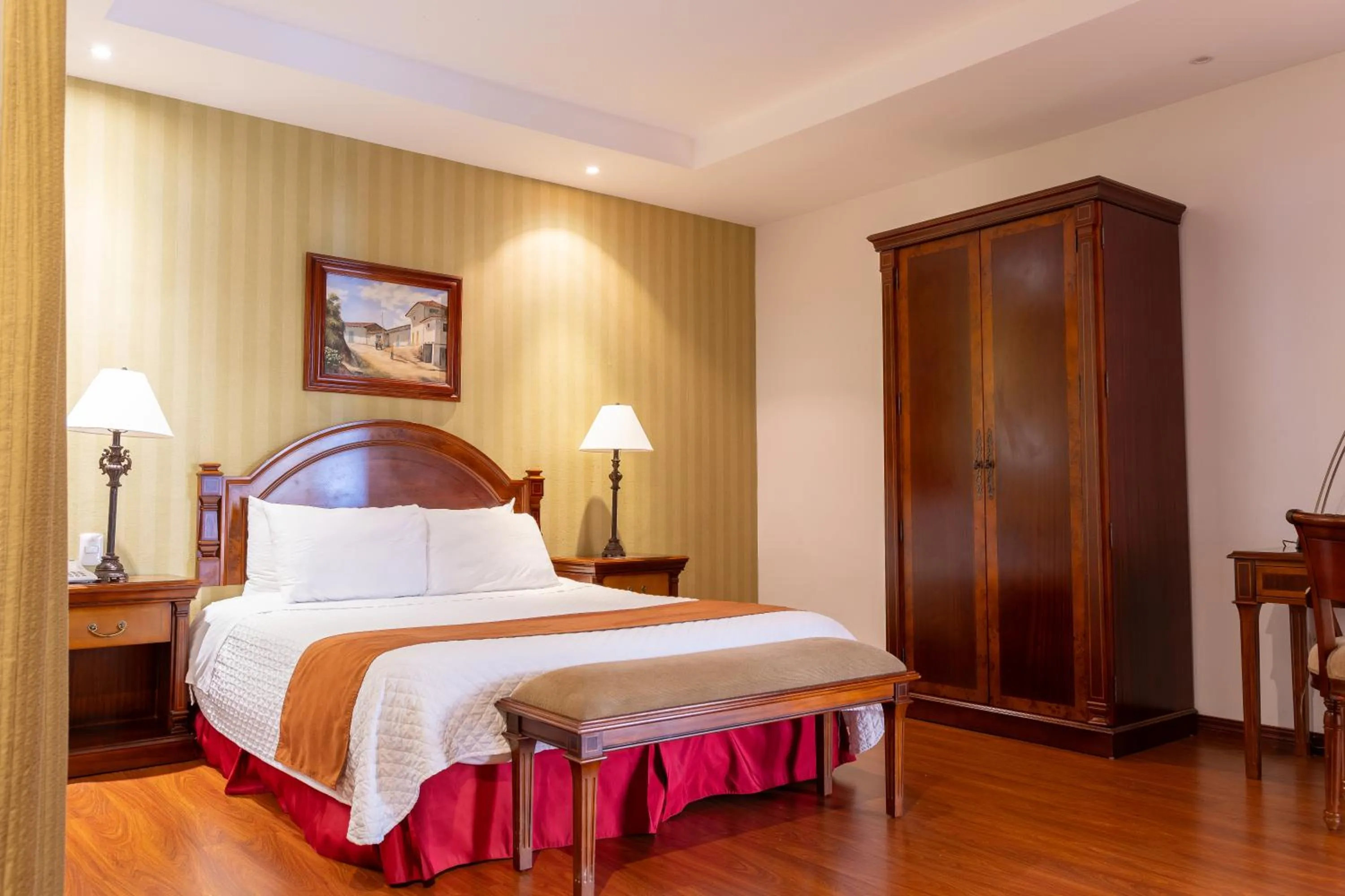 Bed in Grand Victoria Boutique Hotel