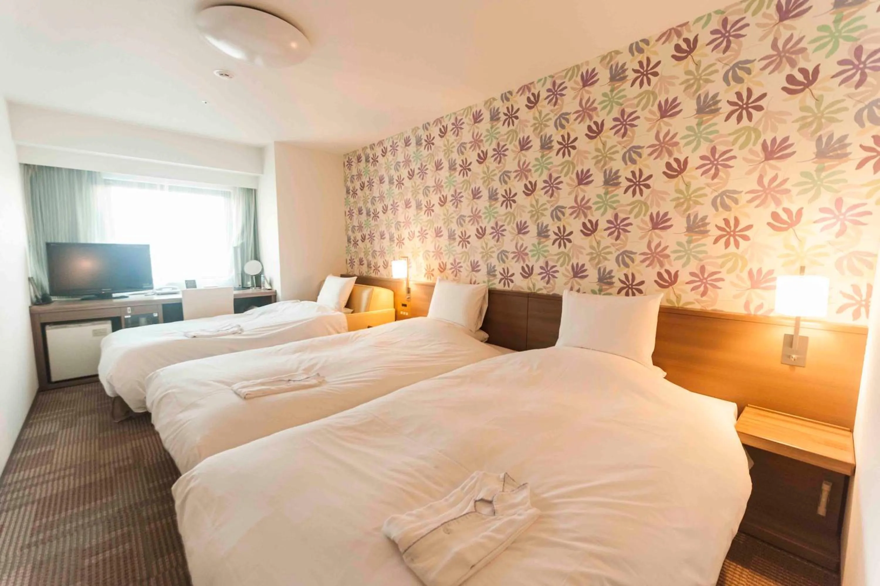 Bed in Daiwa Roynet Hotel Okinawa-Kenchomae