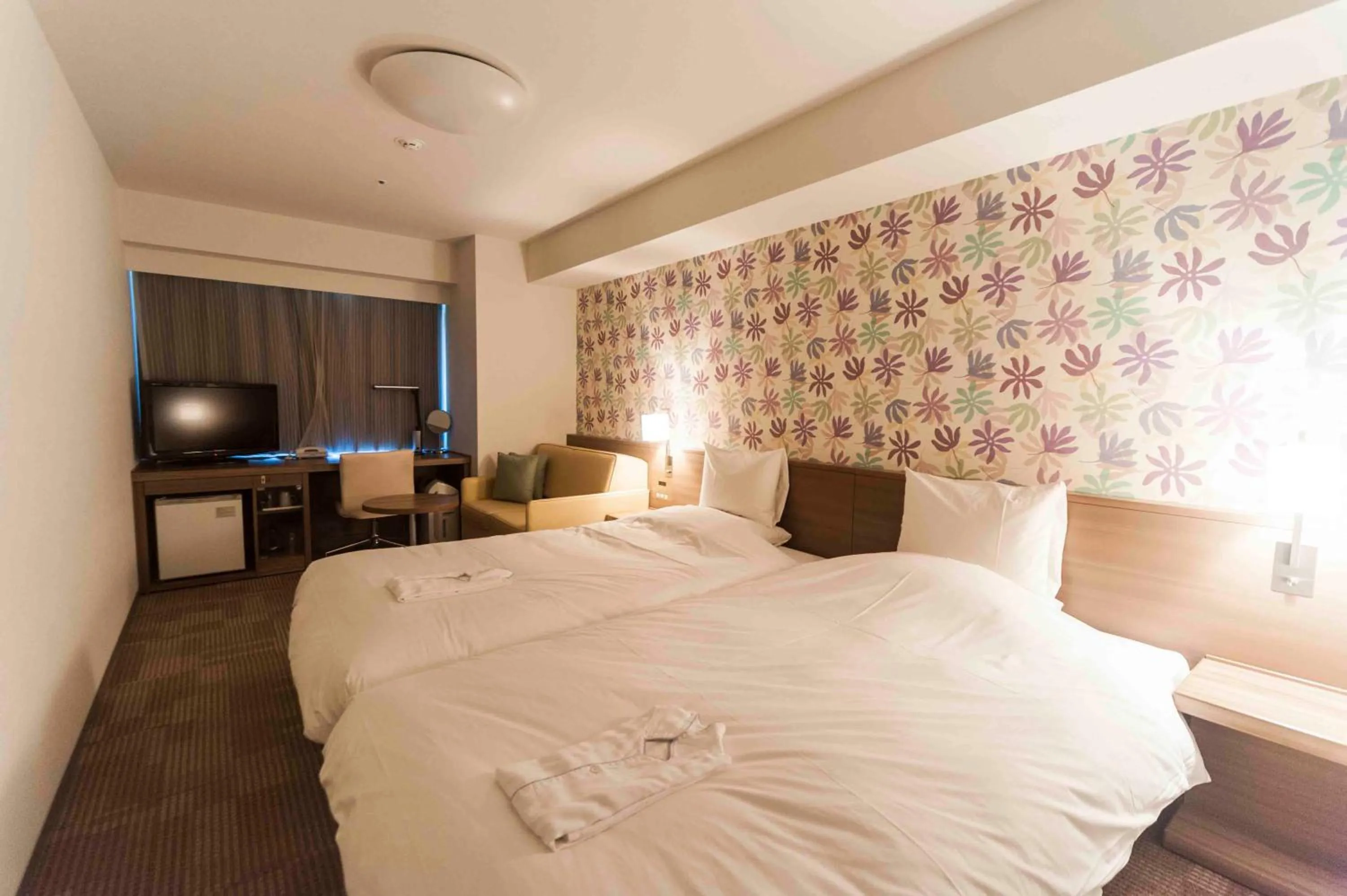 Photo of the whole room, Bed in Daiwa Roynet Hotel Okinawa-Kenchomae
