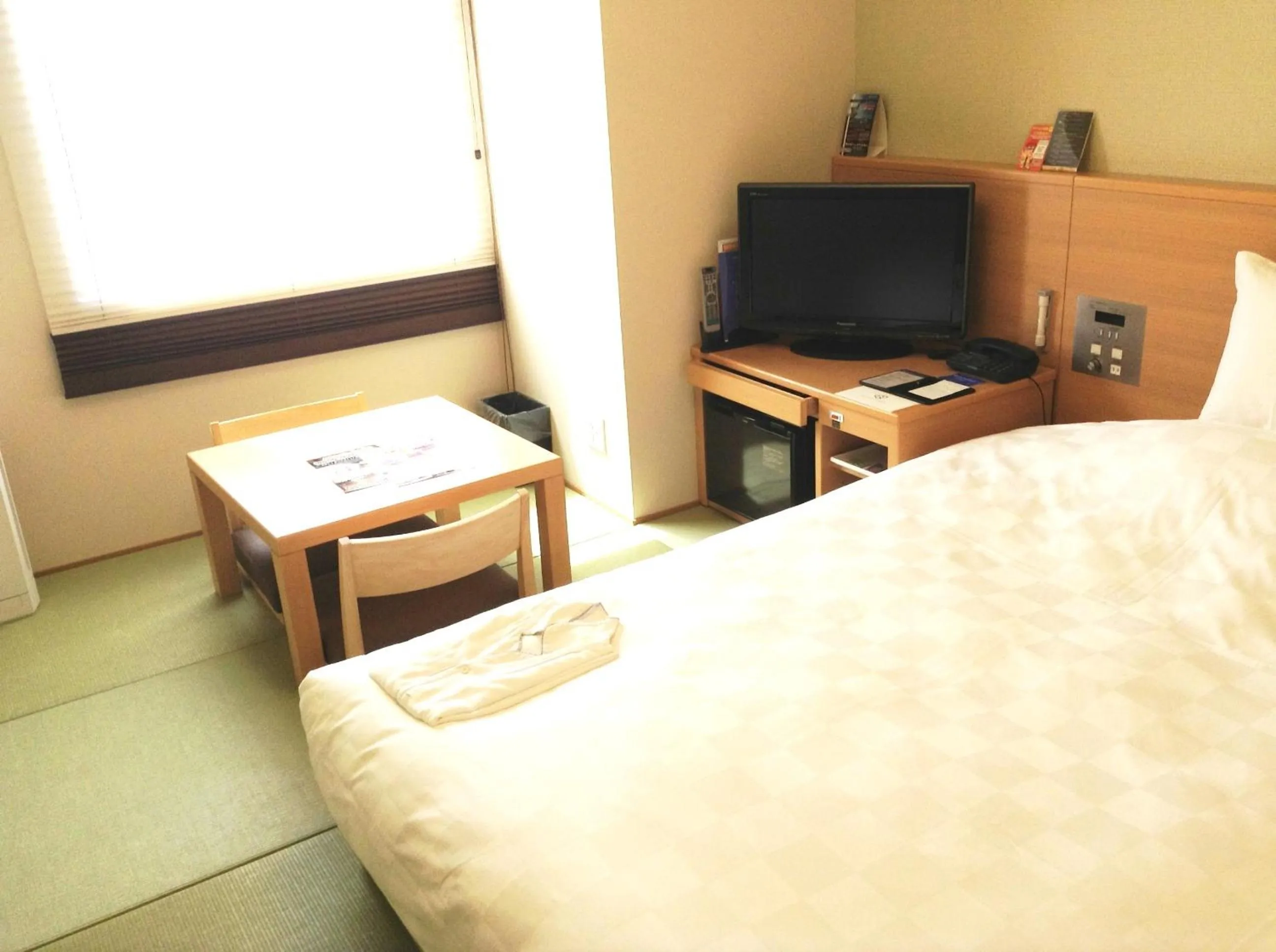 Photo of the whole room, Bed in Daiwa Roynet Hotel Okinawa-Kenchomae