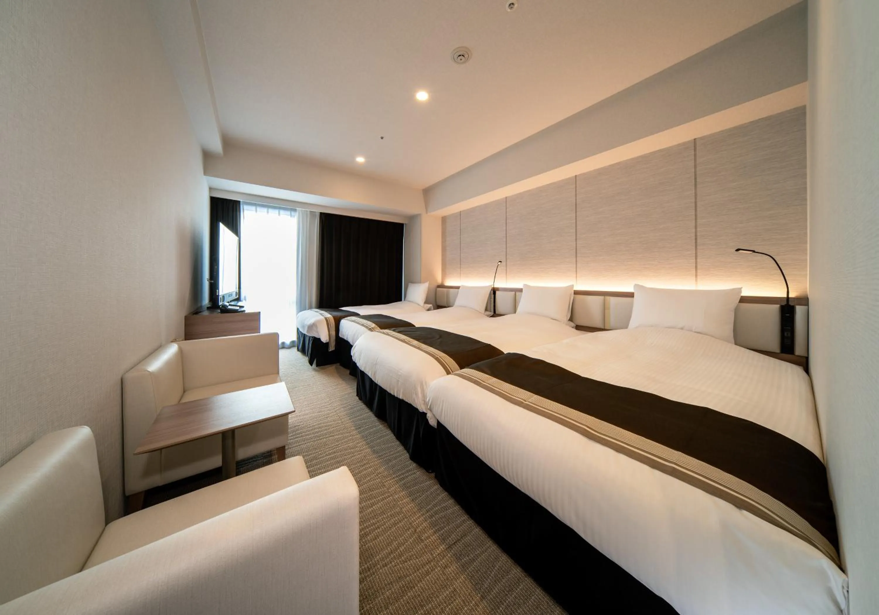 Photo of the whole room, Bed in Daiwa Roynet Hotel Okinawa-Kenchomae