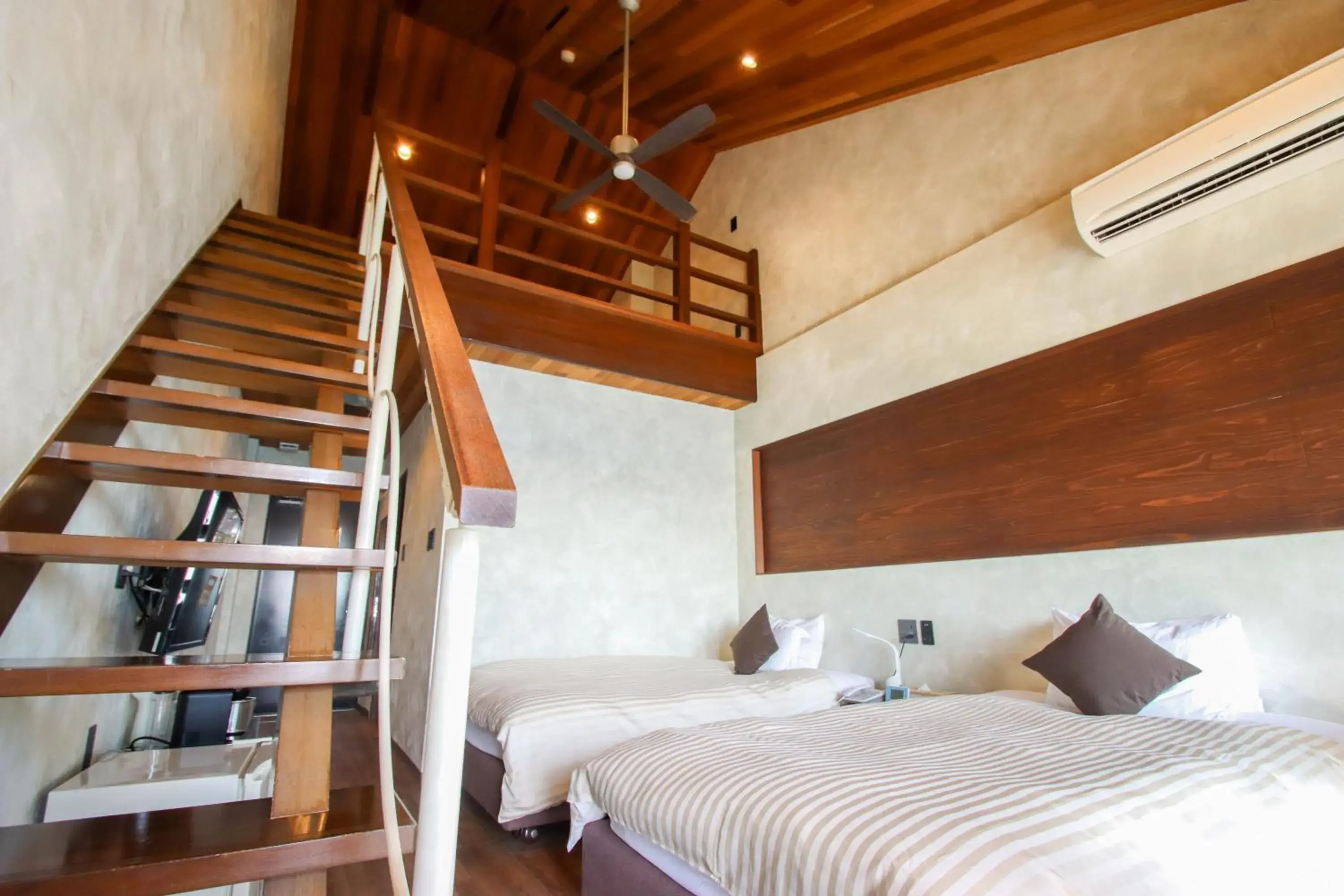 Bed in Petit Resort Native Sea Amami Bed in Petit Resort Native Sea Amami