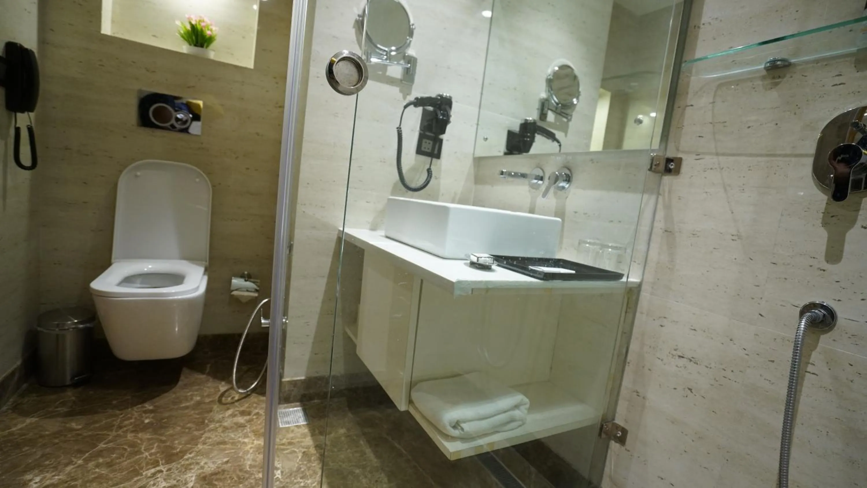 Bathroom in Ramada by Wyndham Aligarh GT Road