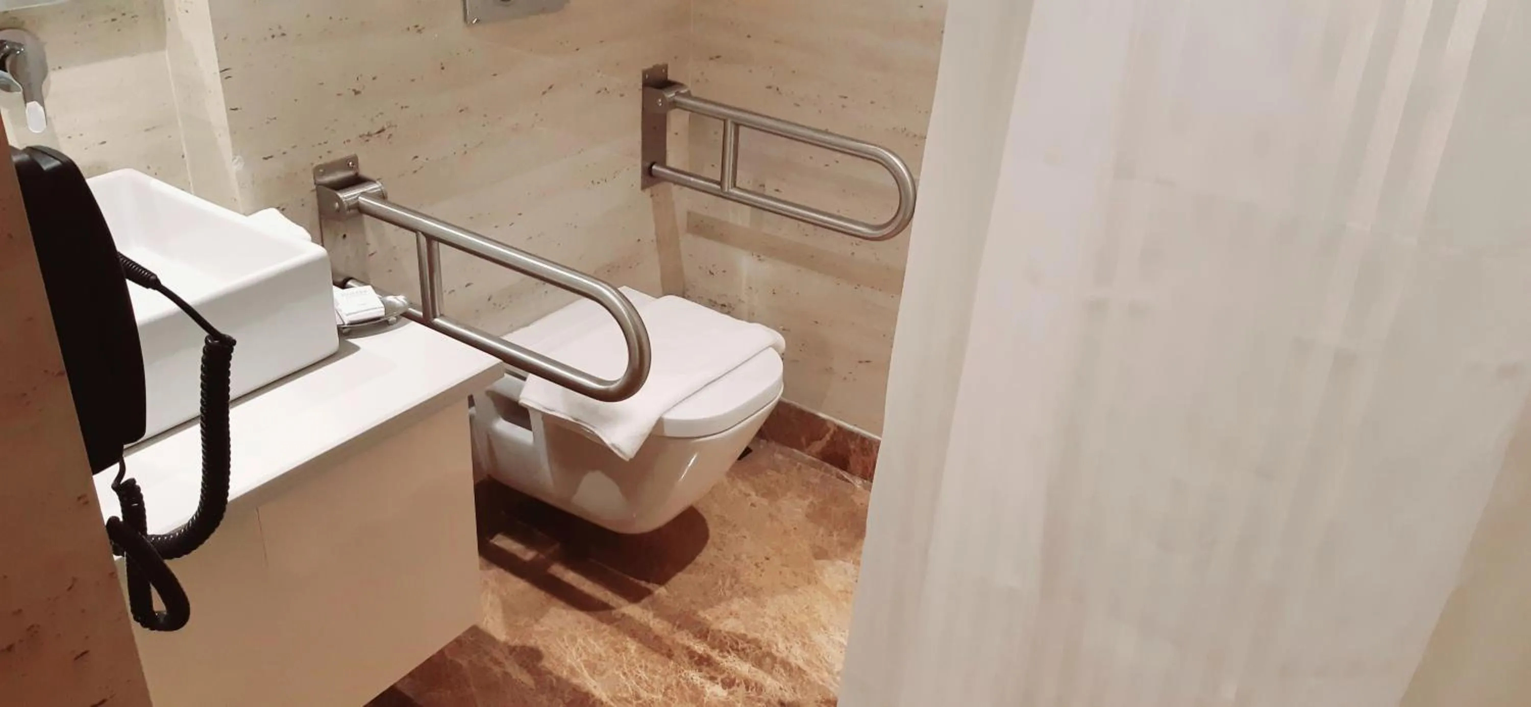 Toilet in Ramada by Wyndham Aligarh GT Road